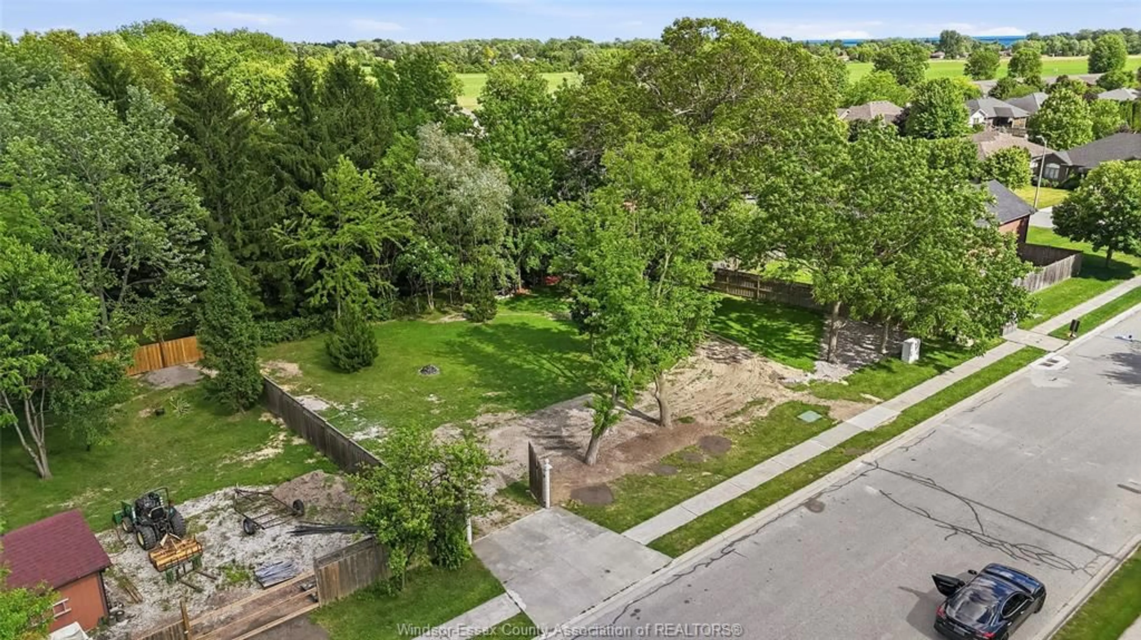 A pic from outside/outdoor area/front of a property/back of a property/a pic from drone, street for V/L CONSERVATION Blvd, Kingsville Ontario N9Y 3Z1