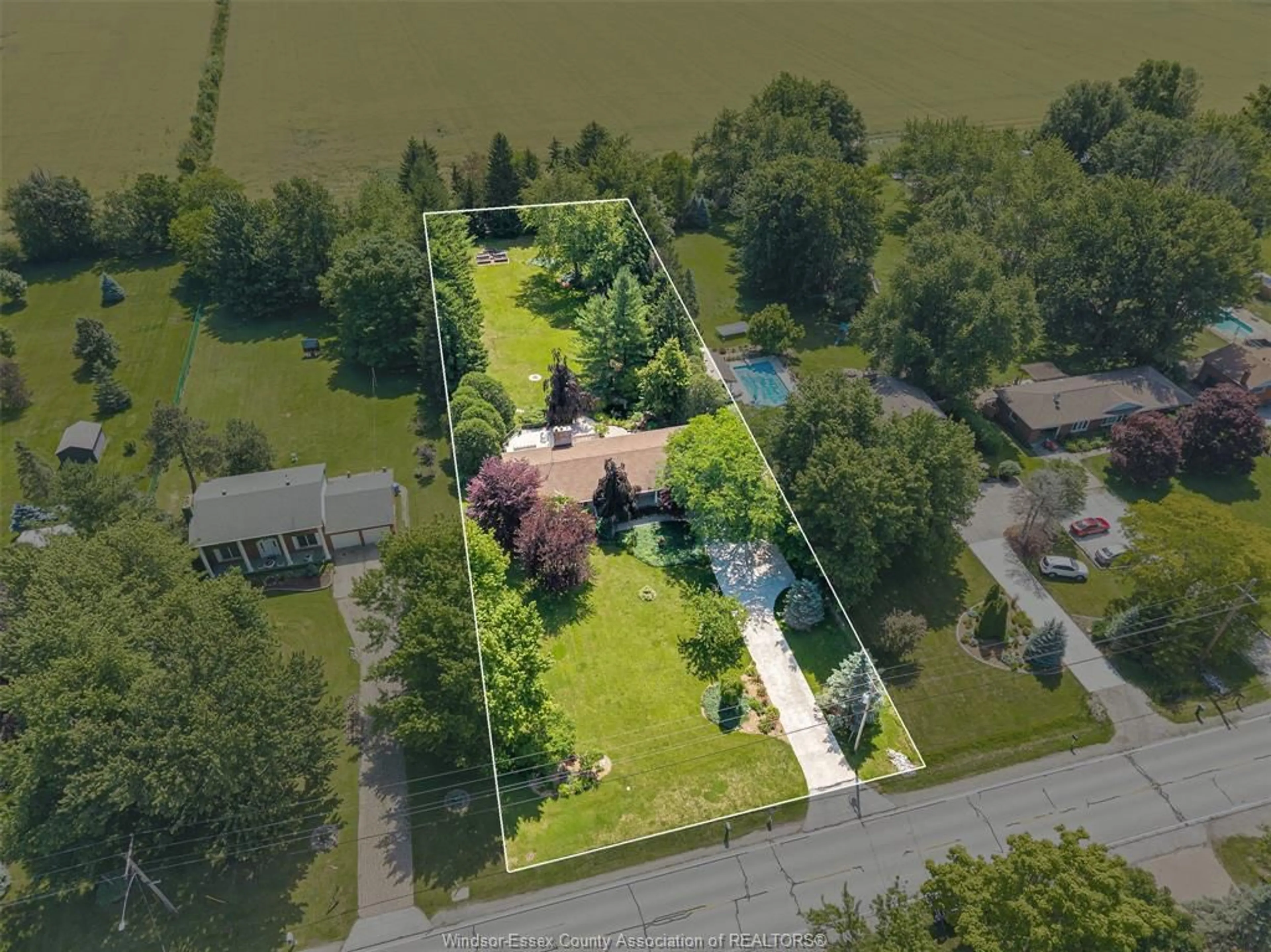 A pic from outside/outdoor area/front of a property/back of a property/a pic from drone, water/lake/river/ocean view for 2348 COUNTY RD 27, Woodslee Ontario N0R 1V0