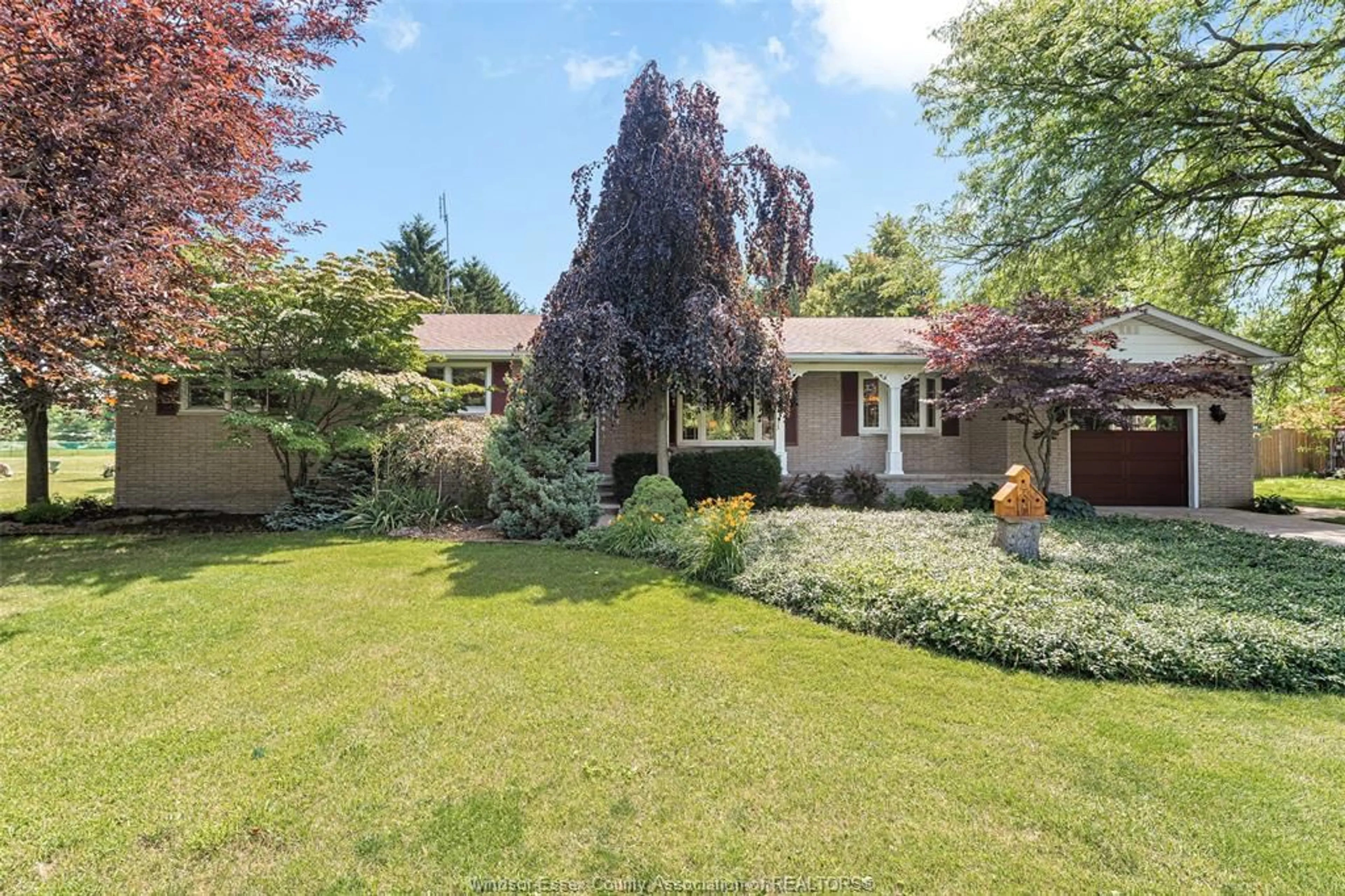 A pic from outside/outdoor area/front of a property/back of a property/a pic from drone, street for 2348 COUNTY RD 27, Woodslee Ontario N0R 1V0