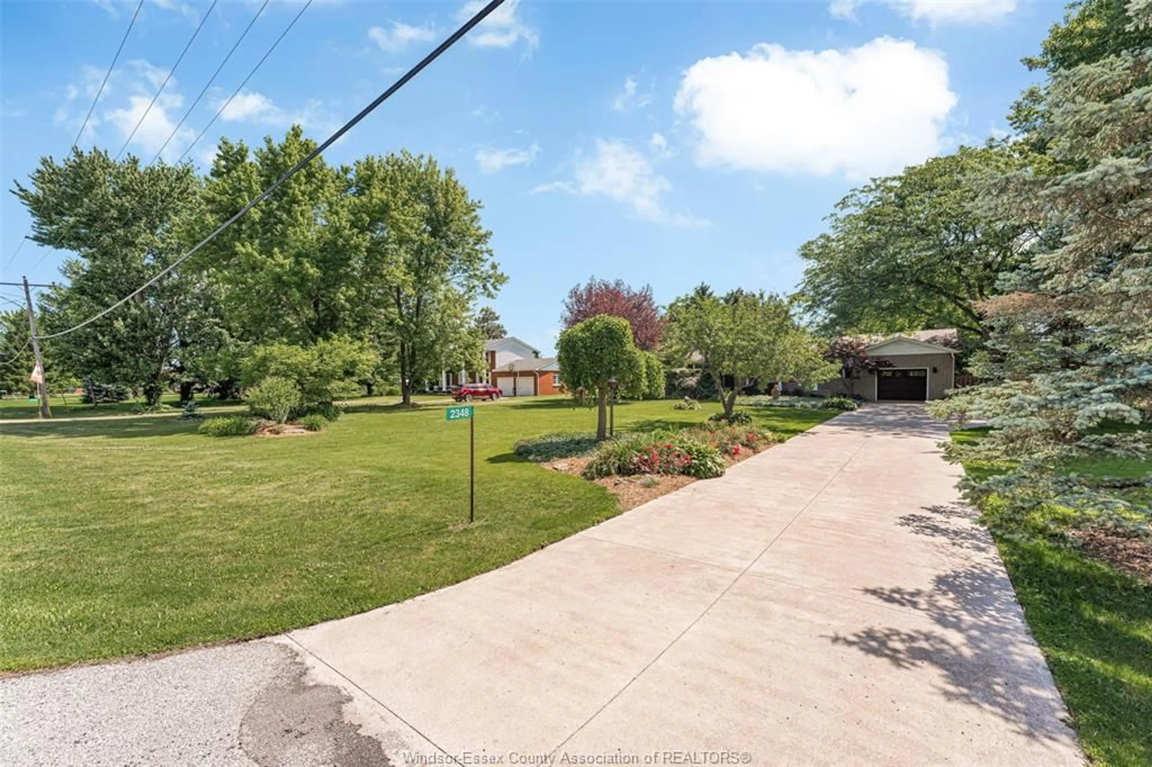 A pic from outside/outdoor area/front of a property/back of a property/a pic from drone, water/lake/river/ocean view for 2348 COUNTY RD 27, Woodslee Ontario N0R 1V0