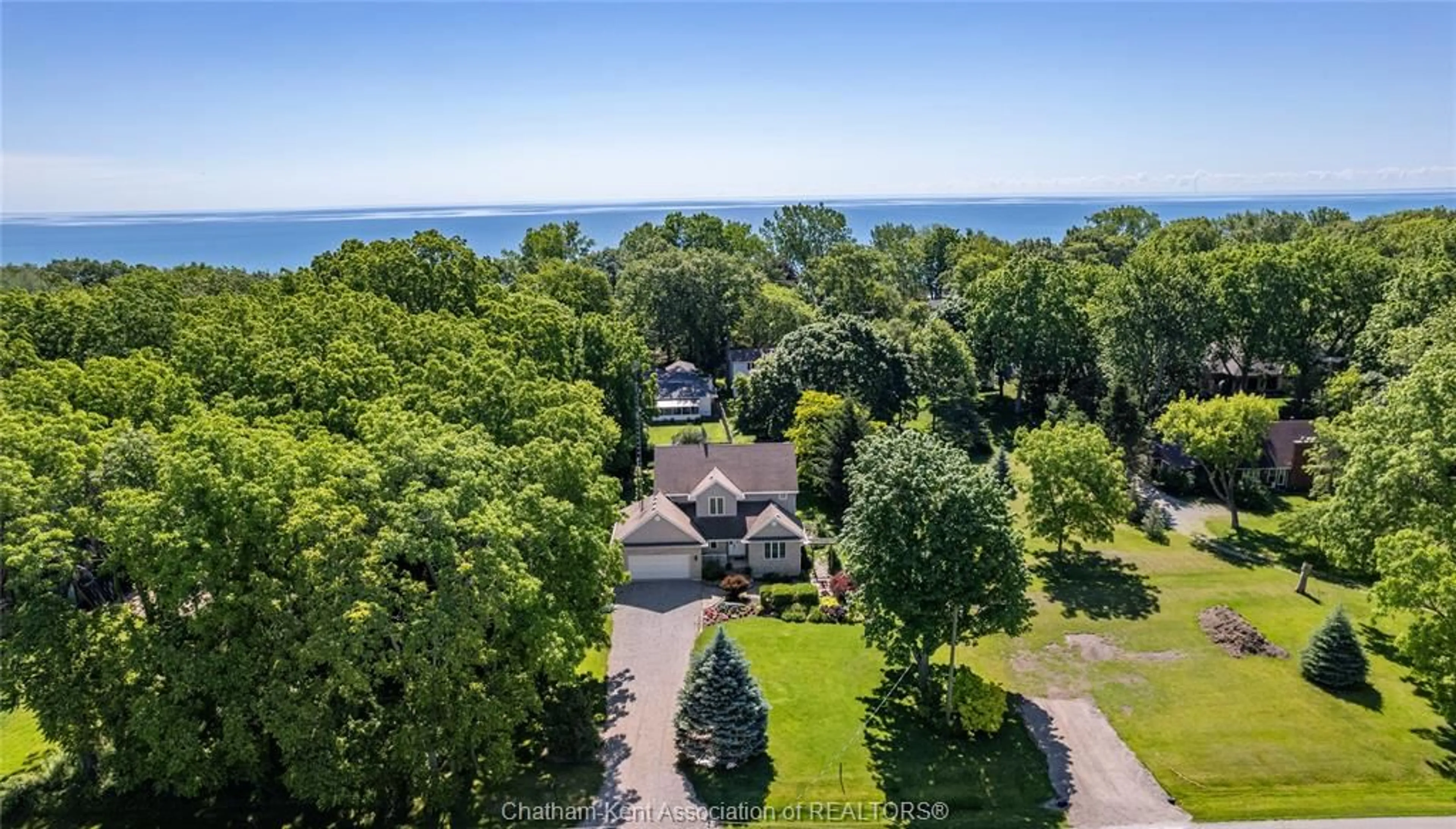 A pic from outside/outdoor area/front of a property/back of a property/a pic from drone, water/lake/river/ocean view for 11782 Rose Beach Line, Howard Township Ontario N0P 1X0
