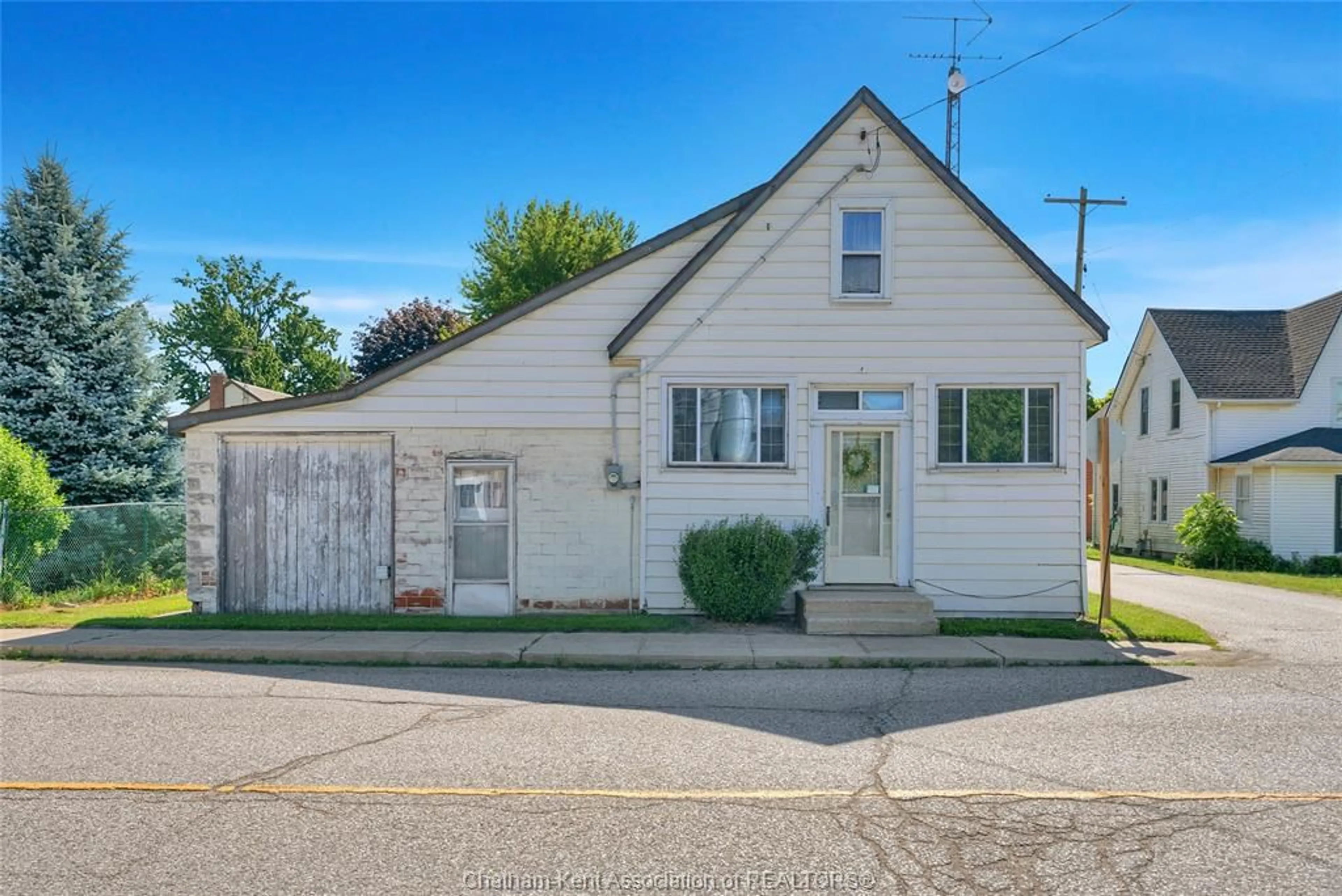 Home with vinyl exterior material, street for 1 Centre Side Rd, Tupperville Ontario N0P 2M0