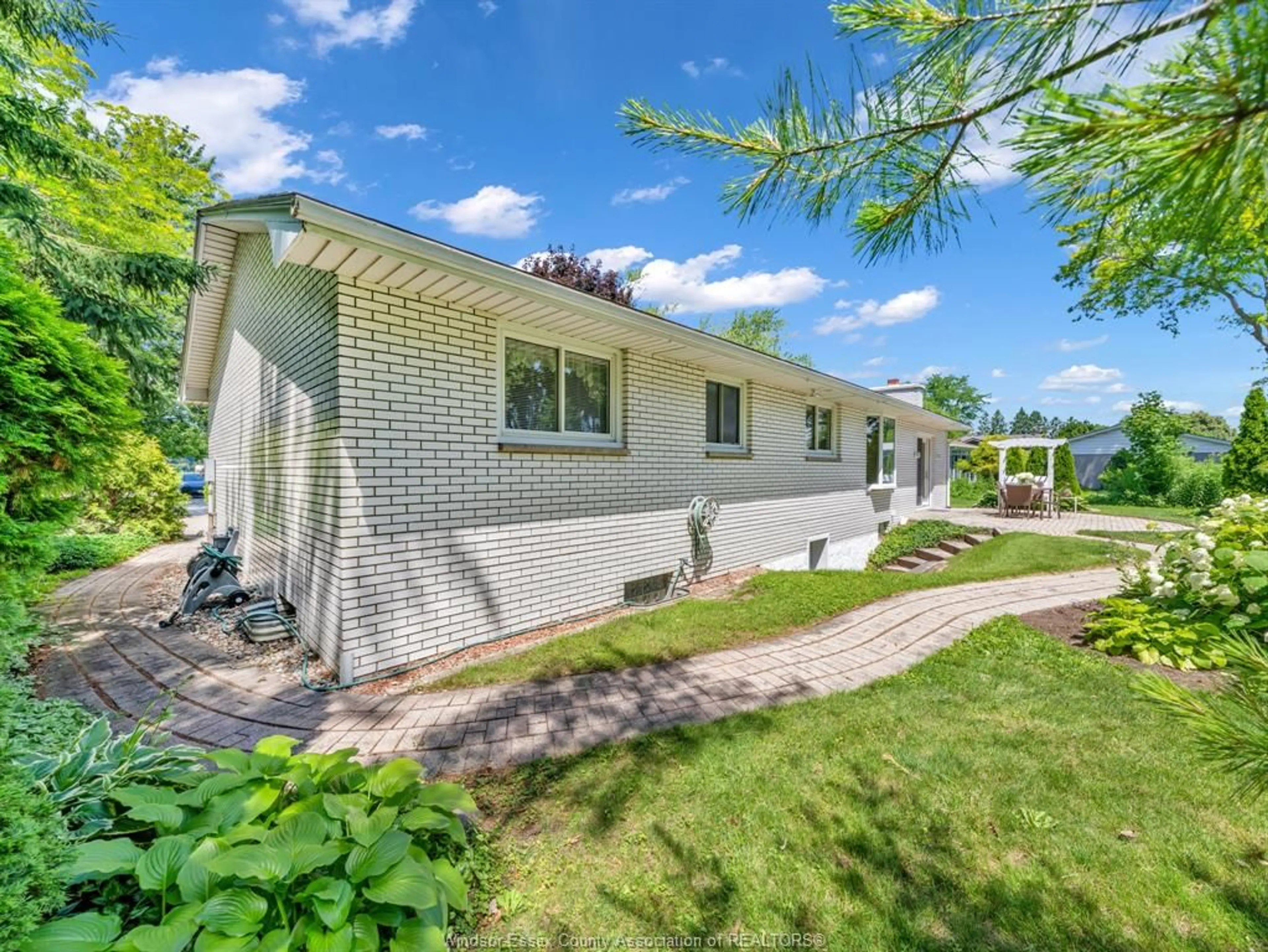 Home with brick exterior material, street for 6580 DISPUTED Rd, LaSalle Ontario N9H 1X9