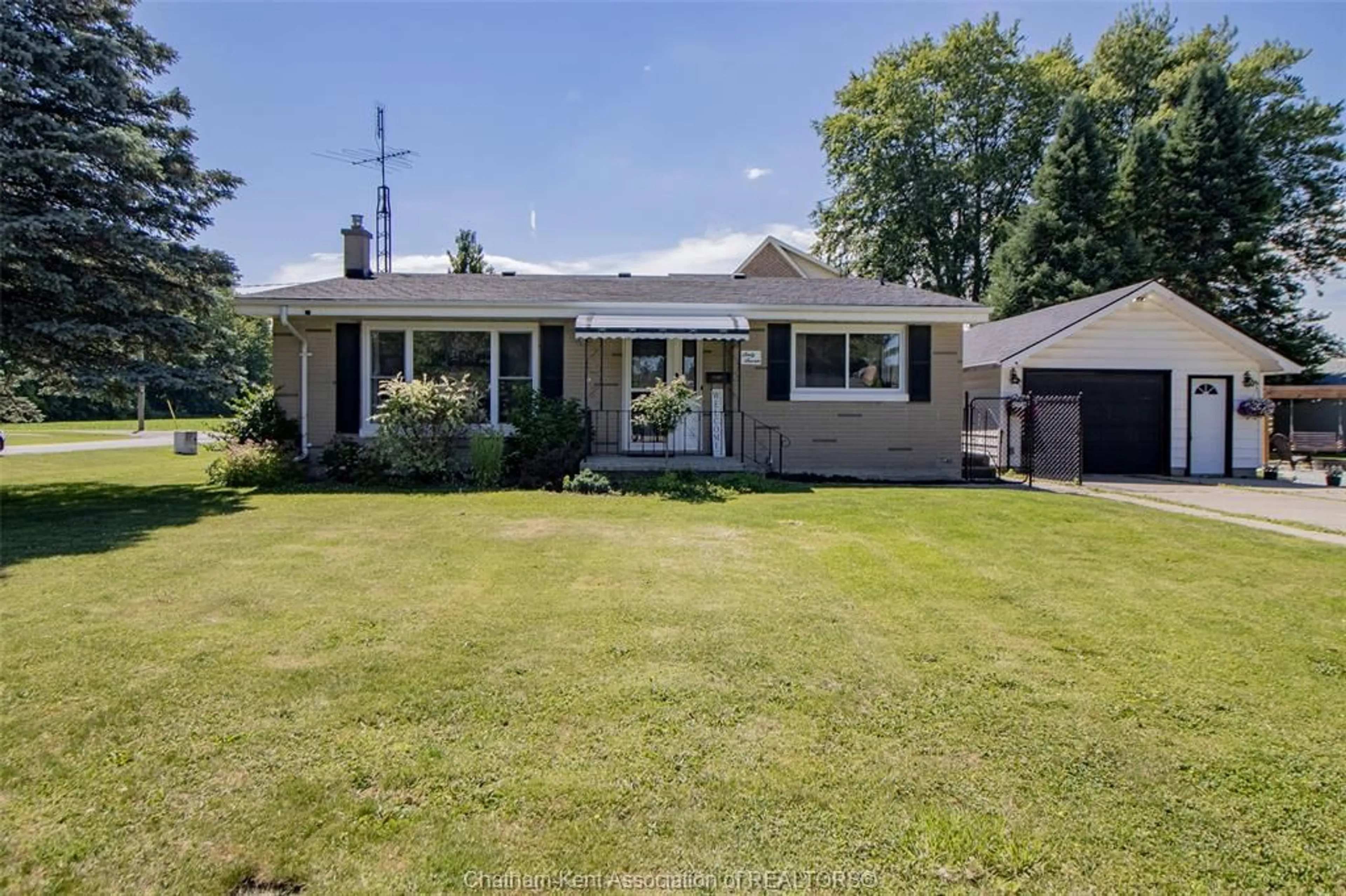 Home with vinyl exterior material, street for 67 Walnut Dr, Wallaceburg Ontario N8A 3L4