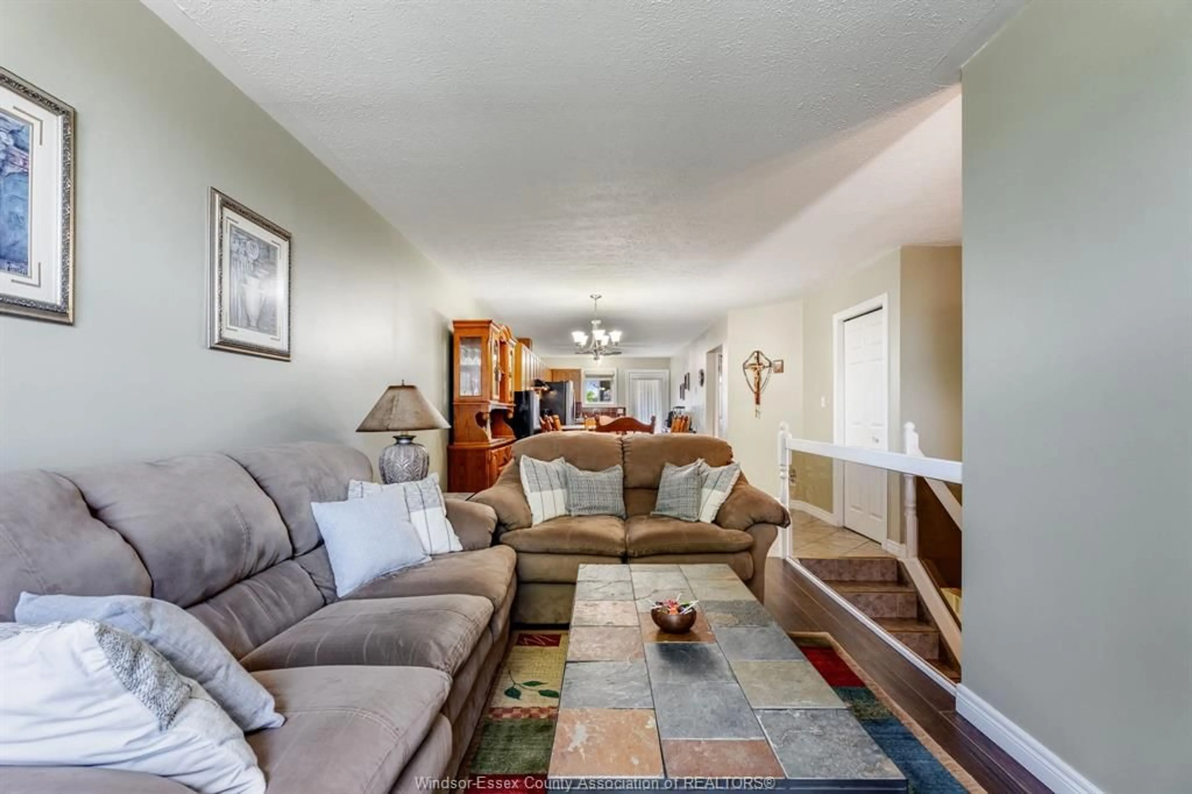 Living room with furniture, unknown for 130 Sturgeon Meadows Ave, Leamington Ontario N8H 5L1
