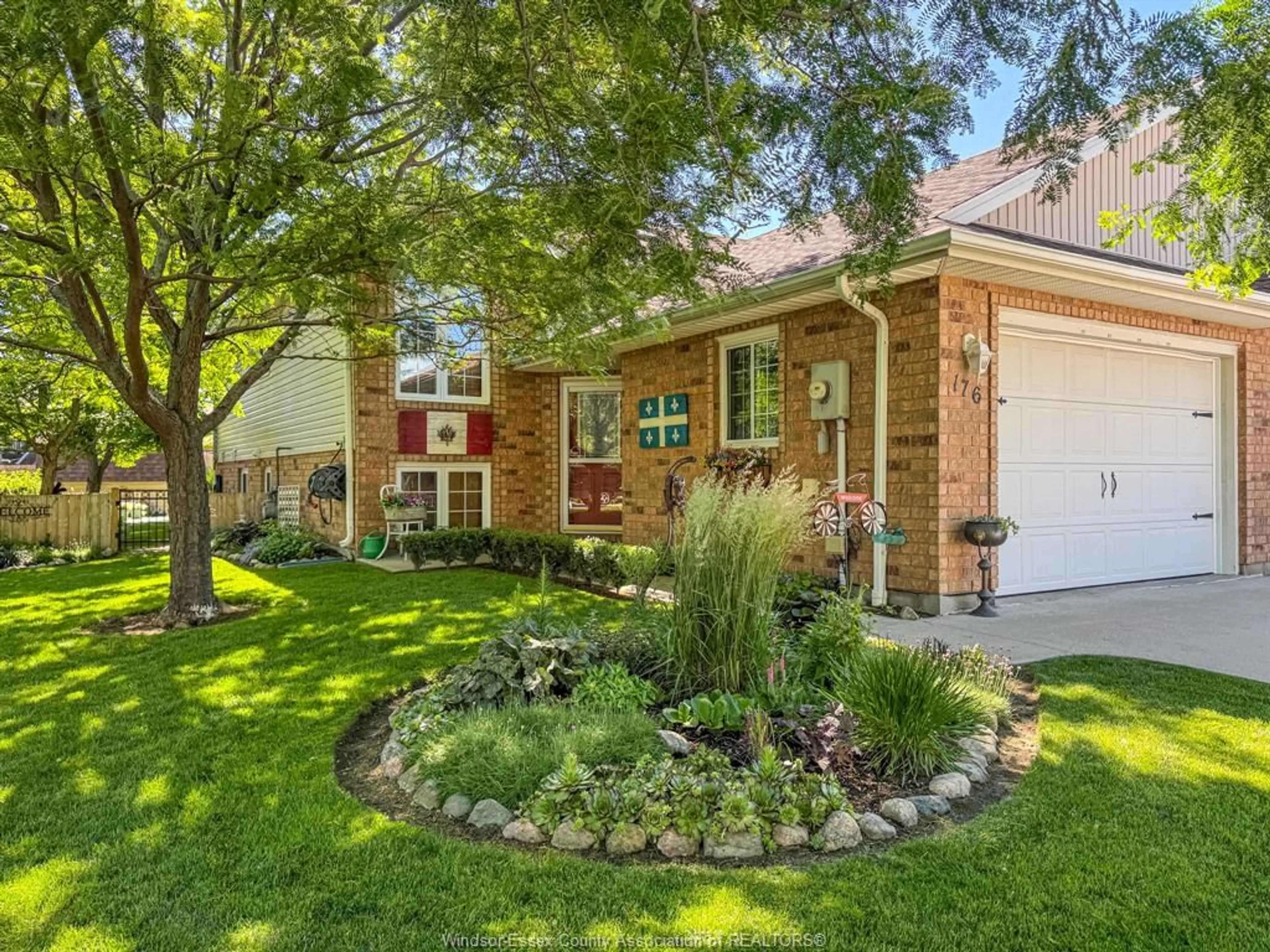 Home with brick exterior material, street for 176 BENNIE AVE, Leamington Ontario N8H 5L8