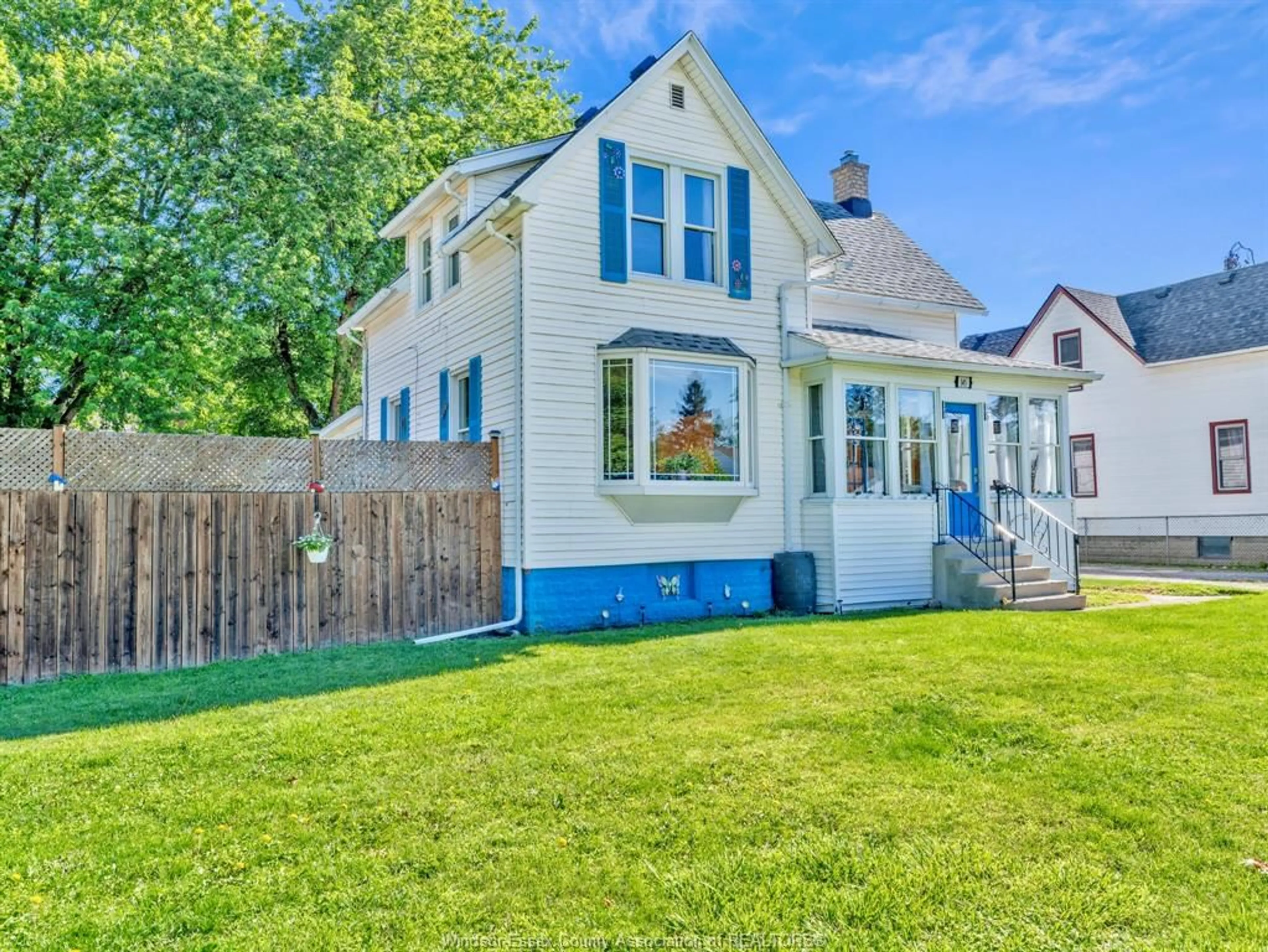 Home with vinyl exterior material, street for 145 Delaware, LaSalle Ontario N9J 1S1