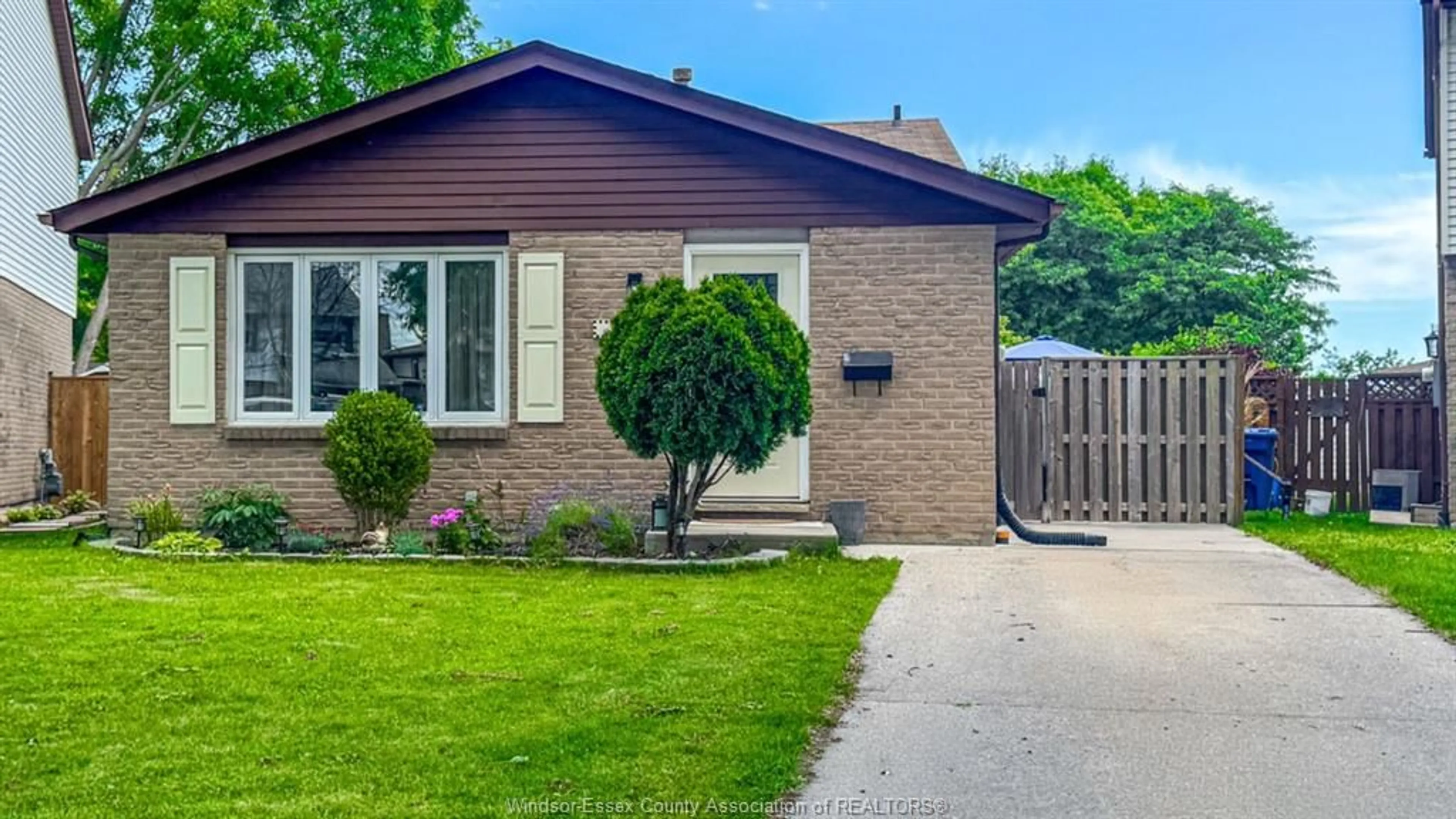 Home with brick exterior material, street for 1343 LEAFIELD, Windsor Ontario N8W 5A2