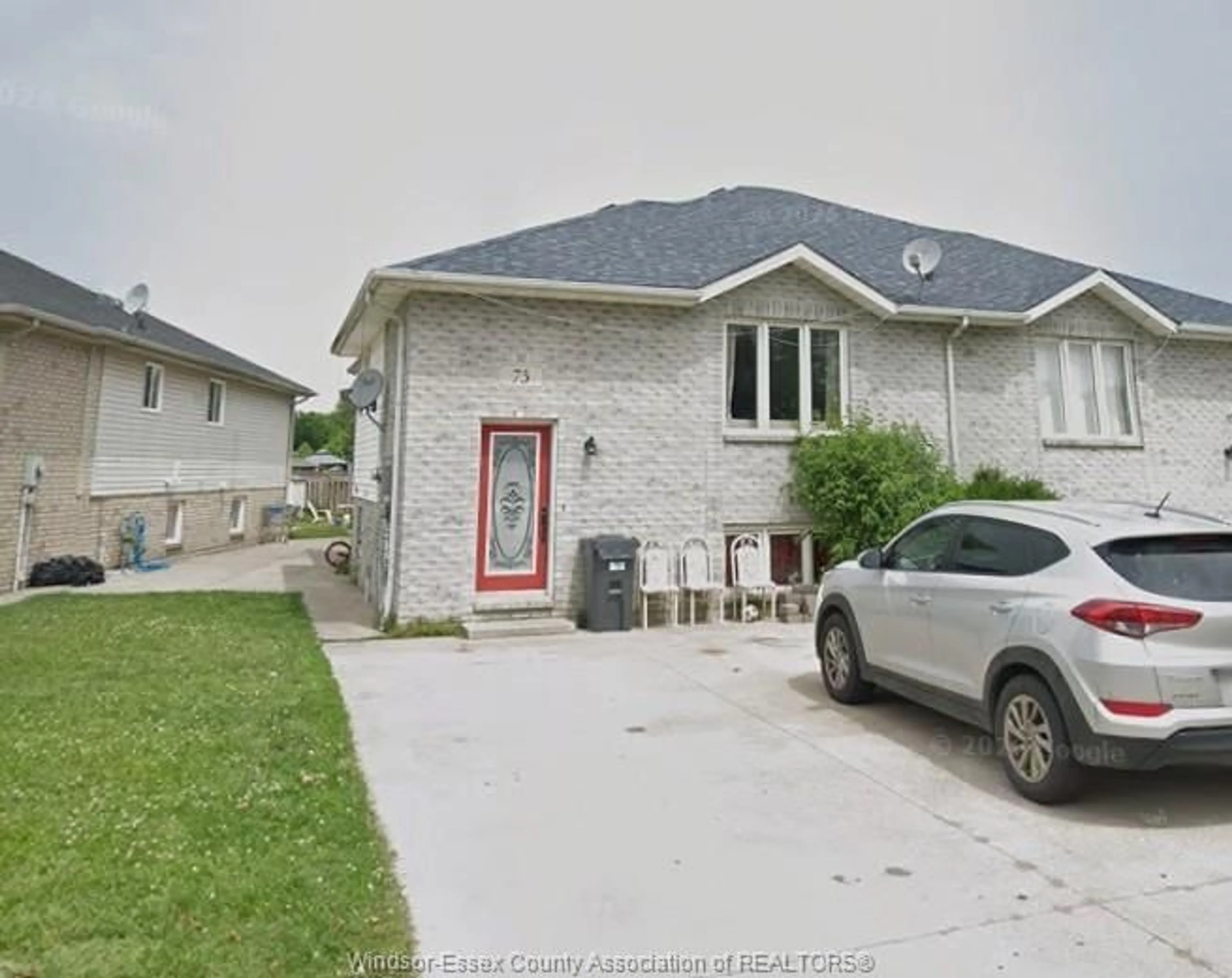 Home with brick exterior material, street for 75 SUTTON Dr, Leamington Ontario N8H 5E9