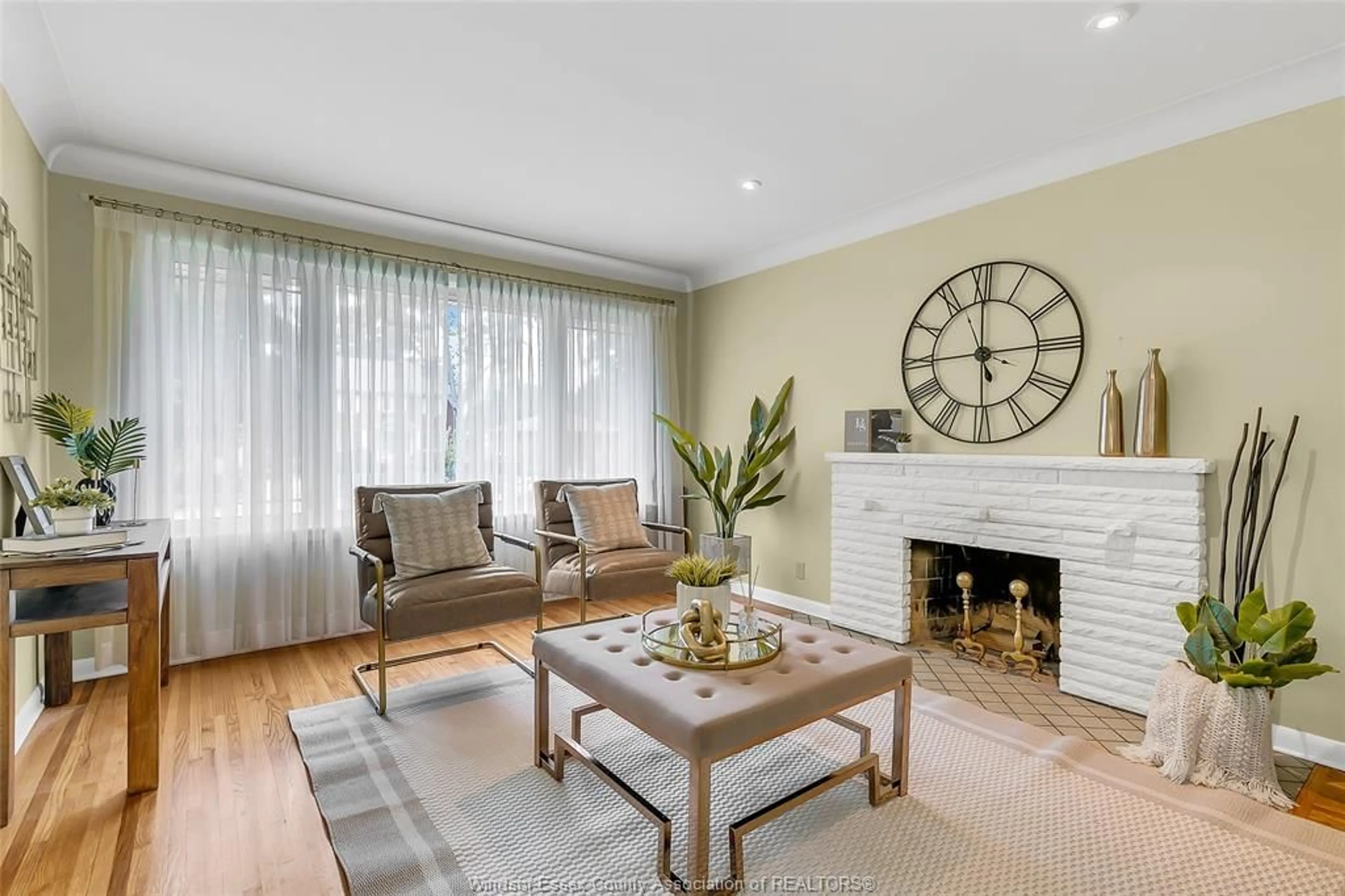 Living room with furniture, wood/laminate floor for 845 ROSSINI Blvd, Windsor Ontario N8Y 2Z2