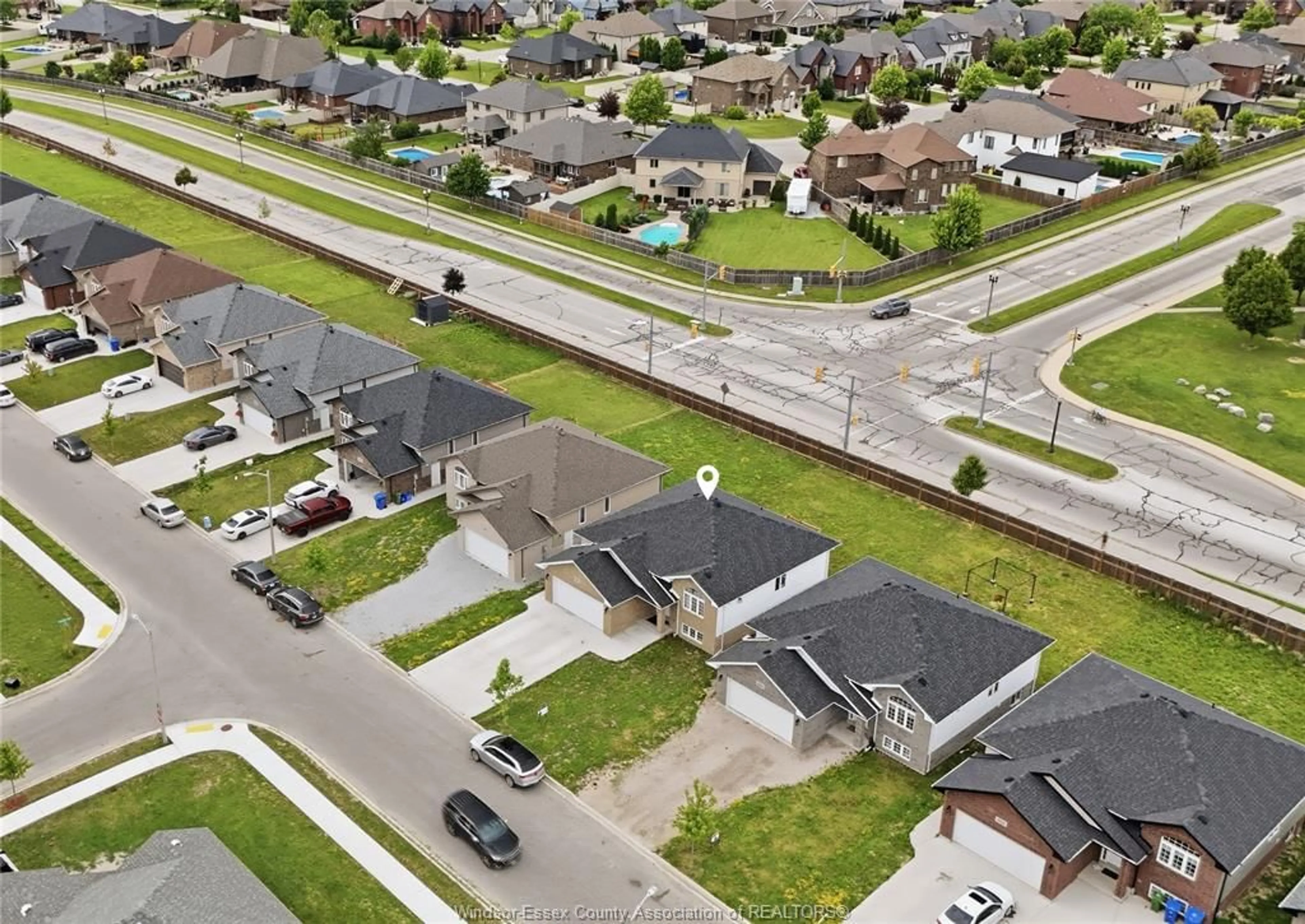 A pic from outside/outdoor area/front of a property/back of a property/a pic from drone, street for 1157 ASPEN RIDGE Cres, Lakeshore Ontario N0R 1A0