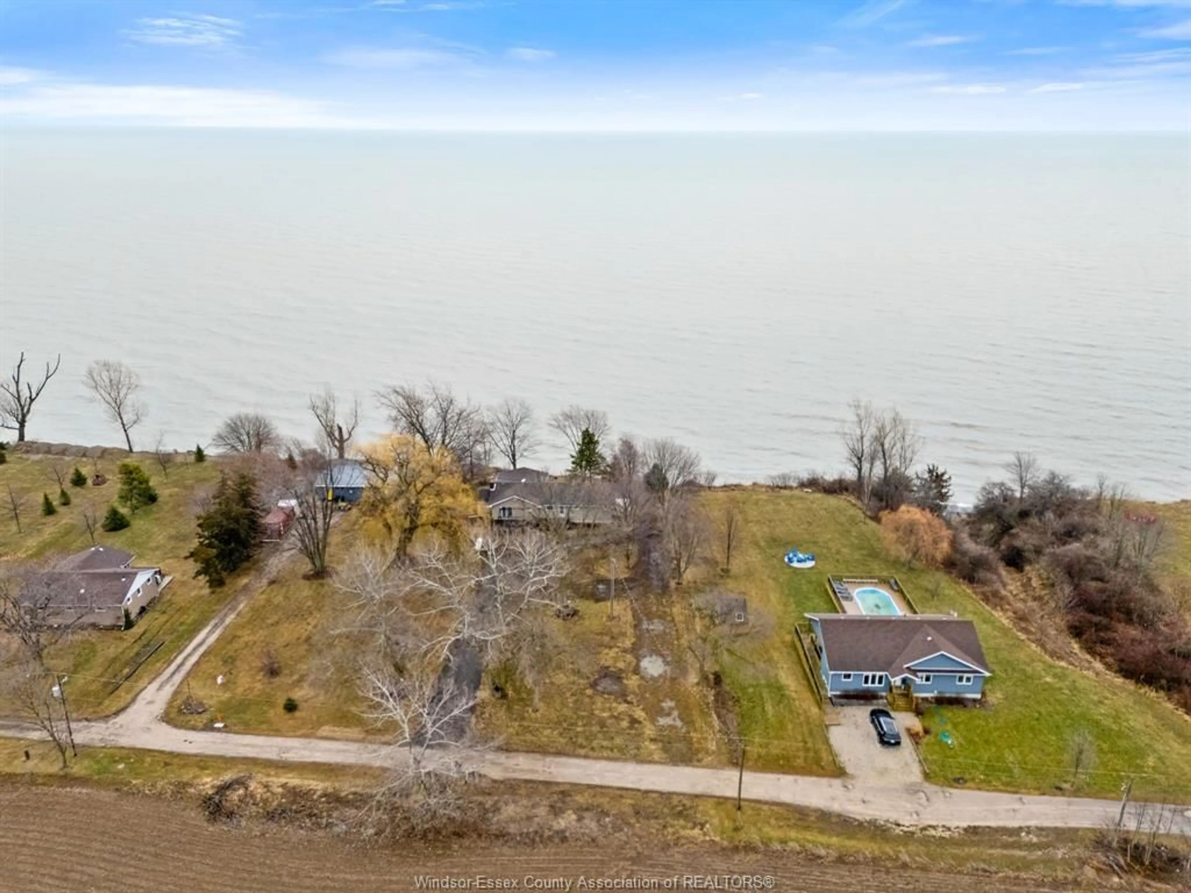 A pic from outside/outdoor area/front of a property/back of a property/a pic from drone, water/lake/river/ocean view for 1956 Ocean Blvd, Wheatley Ontario N0P 2P0