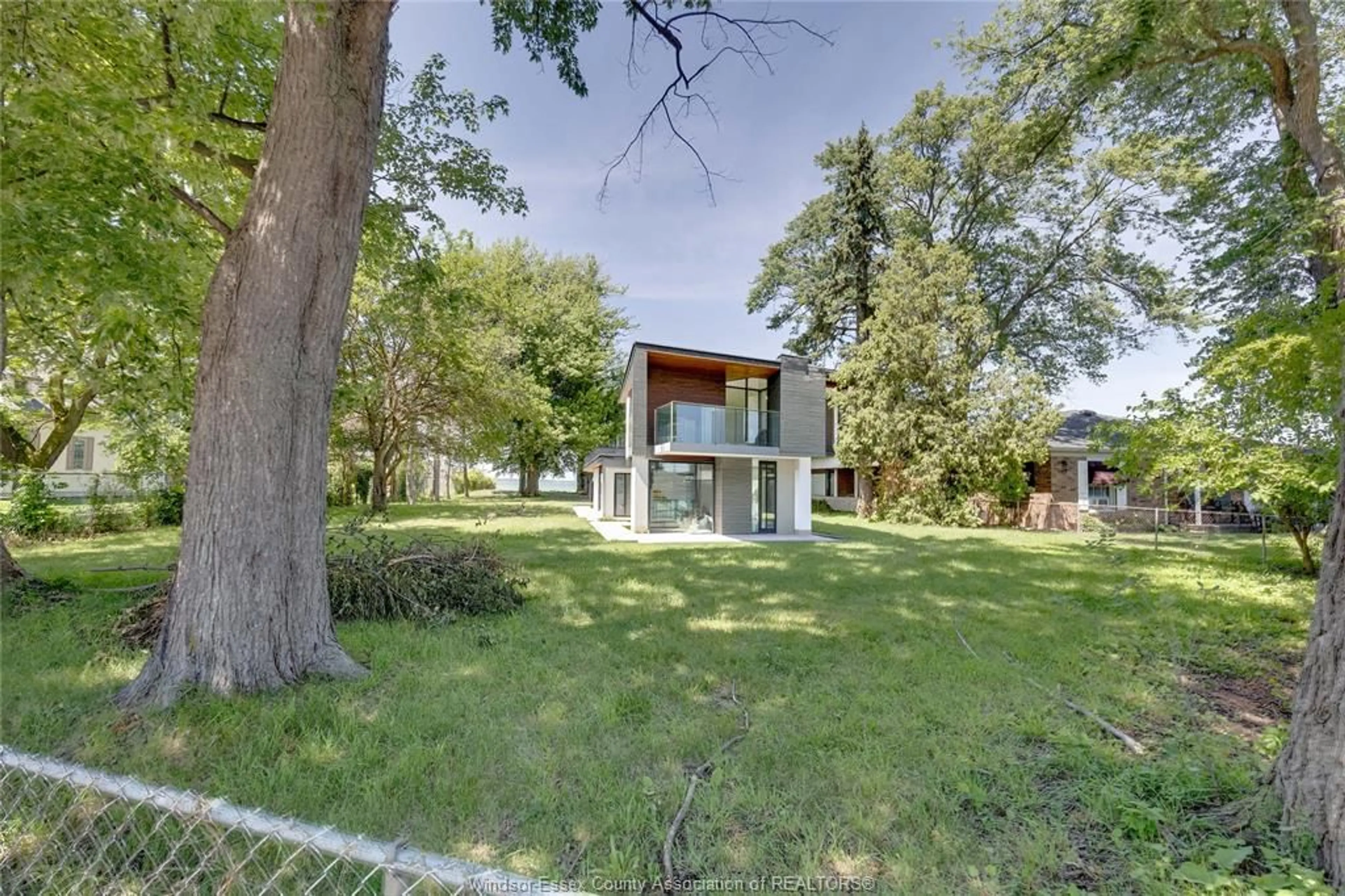 A pic from outside/outdoor area/front of a property/back of a property/a pic from drone, unknown for 13110 RIVERSIDE Dr, Tecumseh Ontario N8N 2M6
