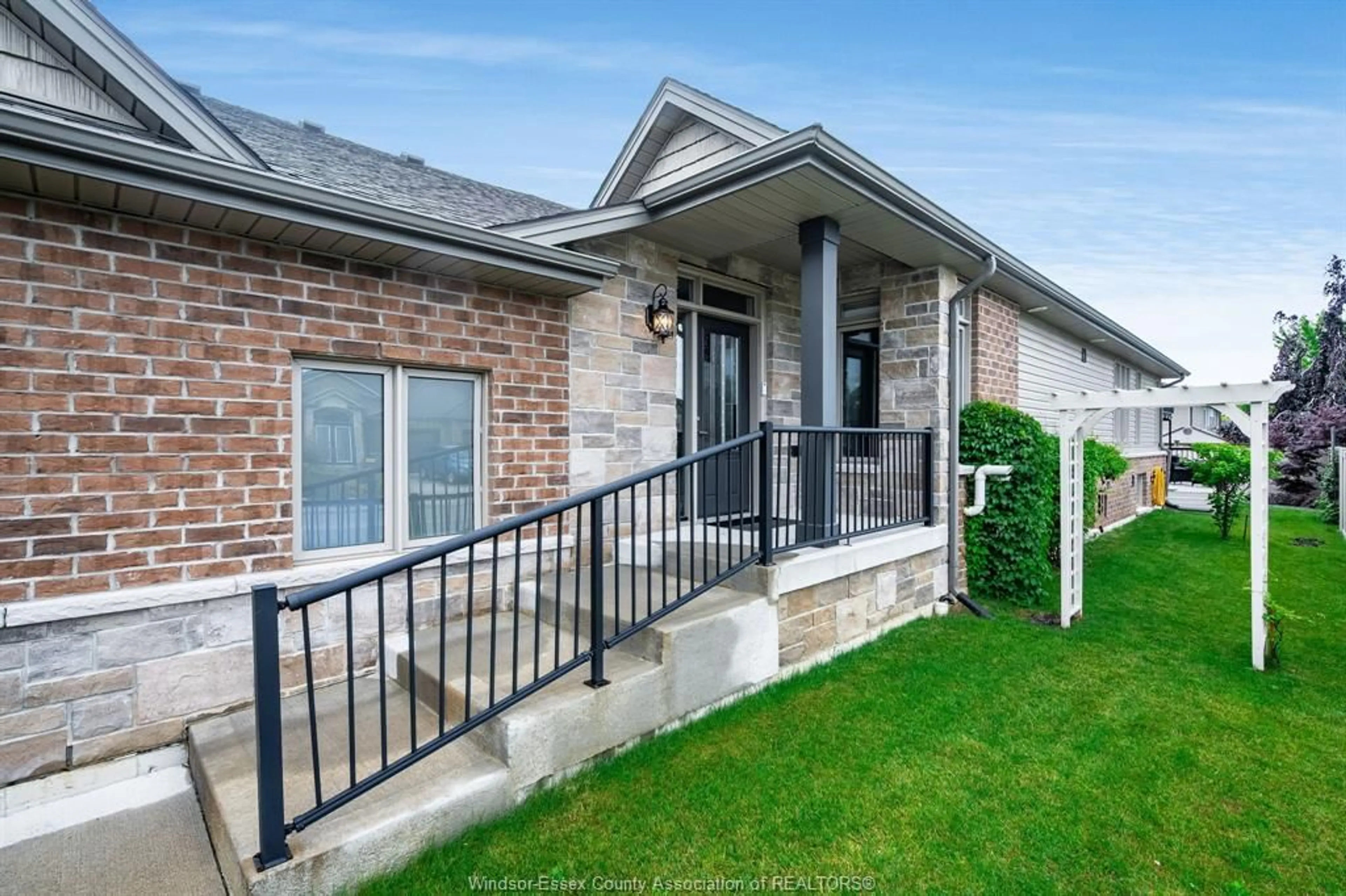 Home with brick exterior material, unknown for 1 Woodland St, Kingsville Ontario N9Y 0B1