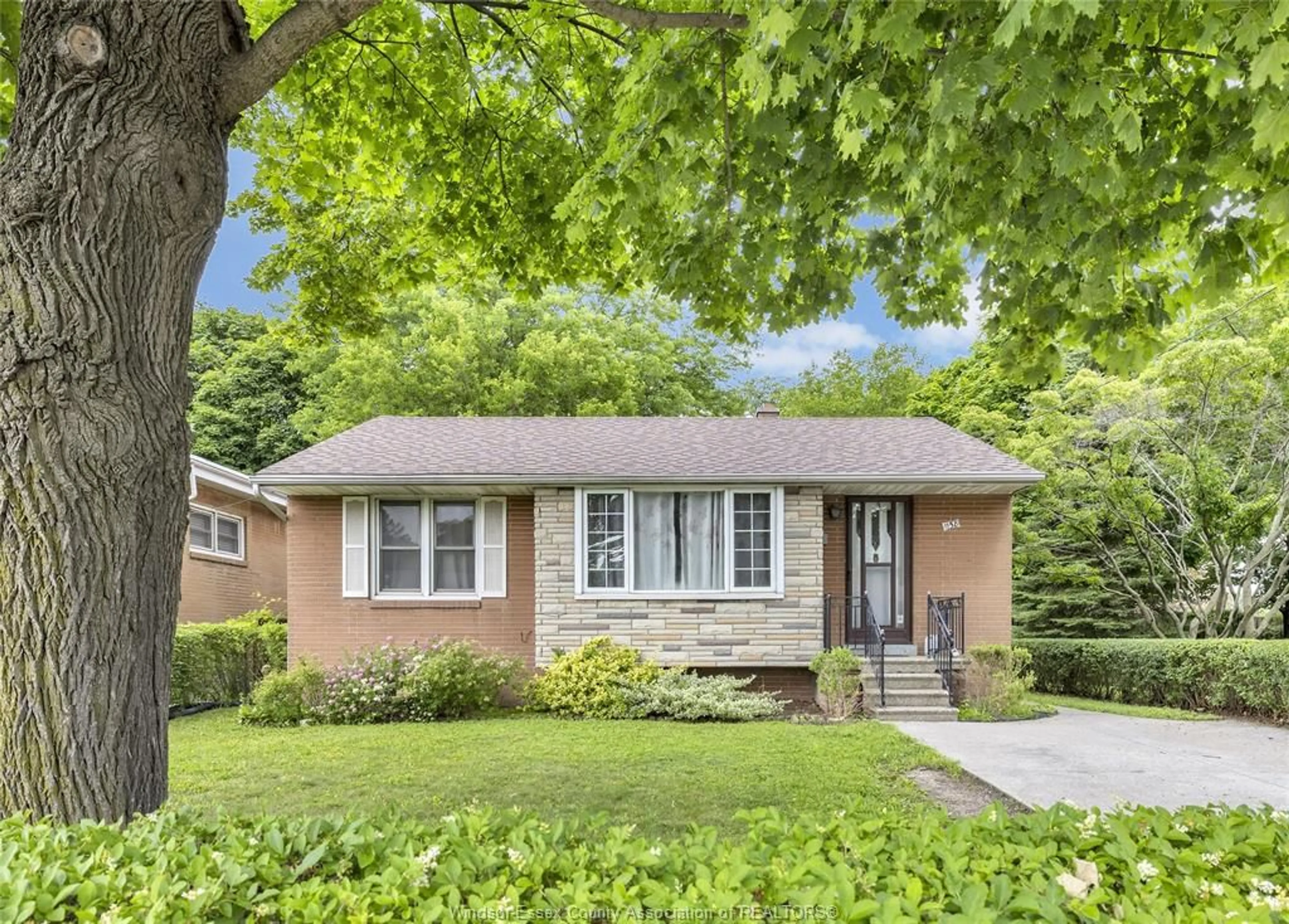 Home with brick exterior material, street for 1158 DOT Ave, Windsor Ontario N9C 3J1
