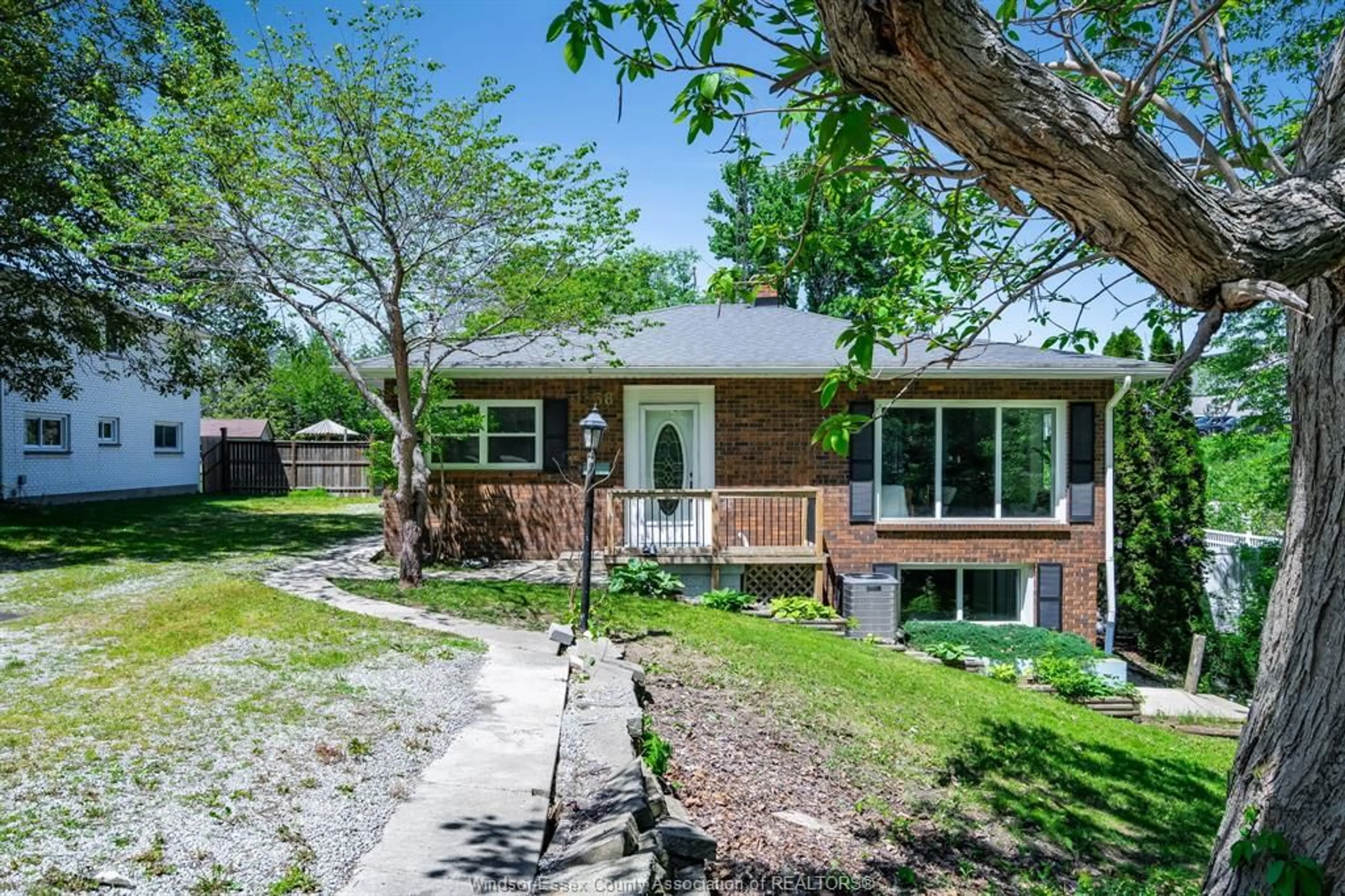 Home with brick exterior material, street for 1838 Seacliff Dr, Kingsville Ontario N9Y 2M6