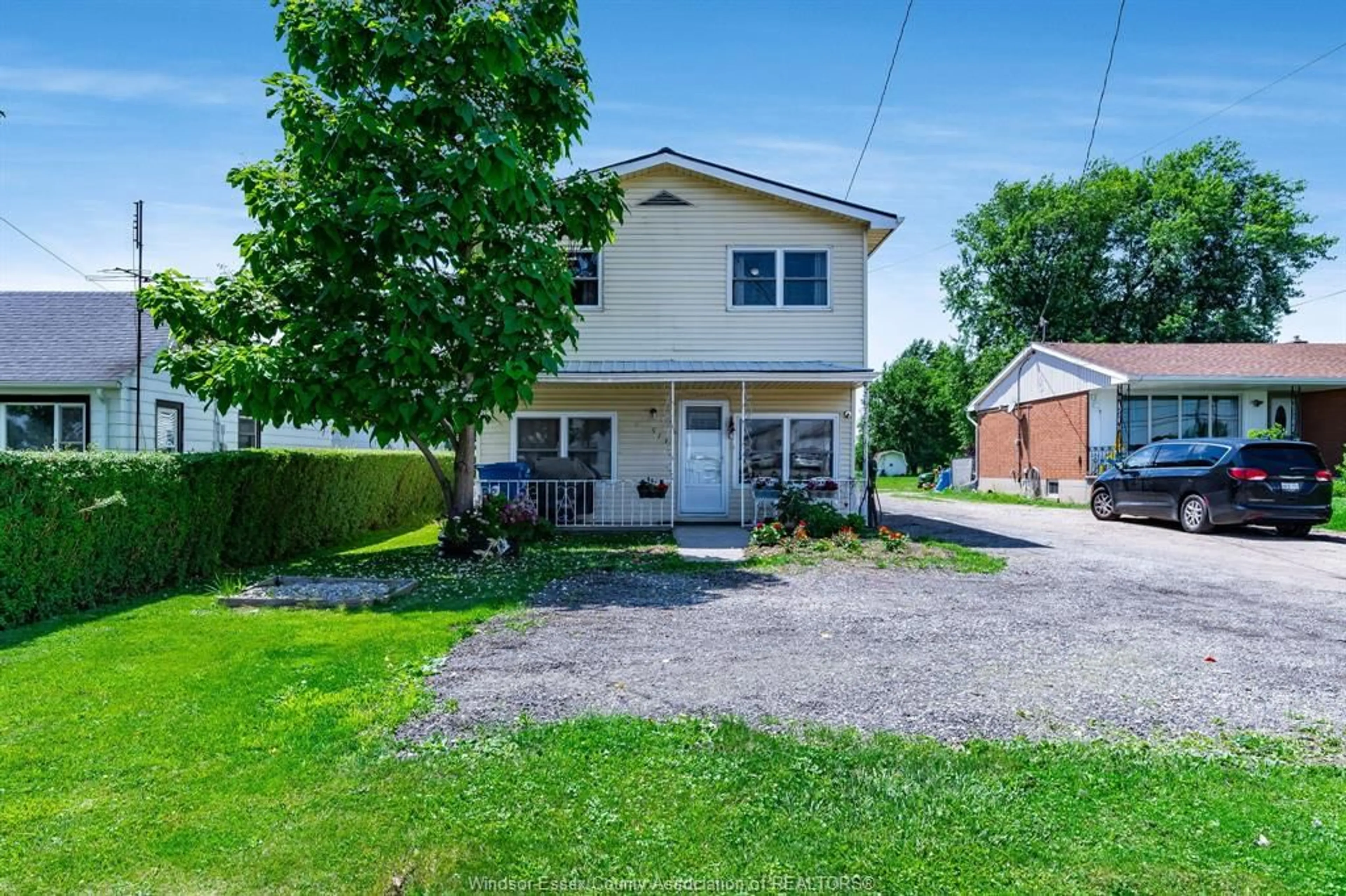 A pic from outside/outdoor area/front of a property/back of a property/a pic from drone, street for 513 Highway 77, Leamington Ontario N8H 3V8