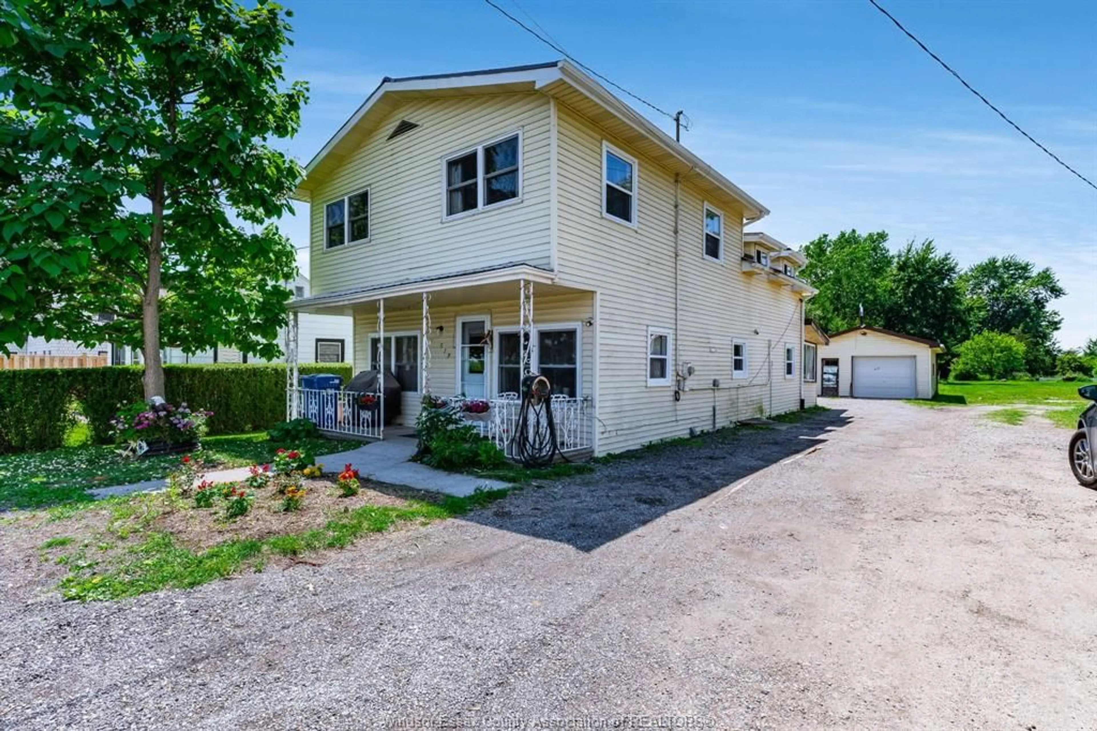 A pic from outside/outdoor area/front of a property/back of a property/a pic from drone, street for 513 Highway 77, Leamington Ontario N8H 3V8