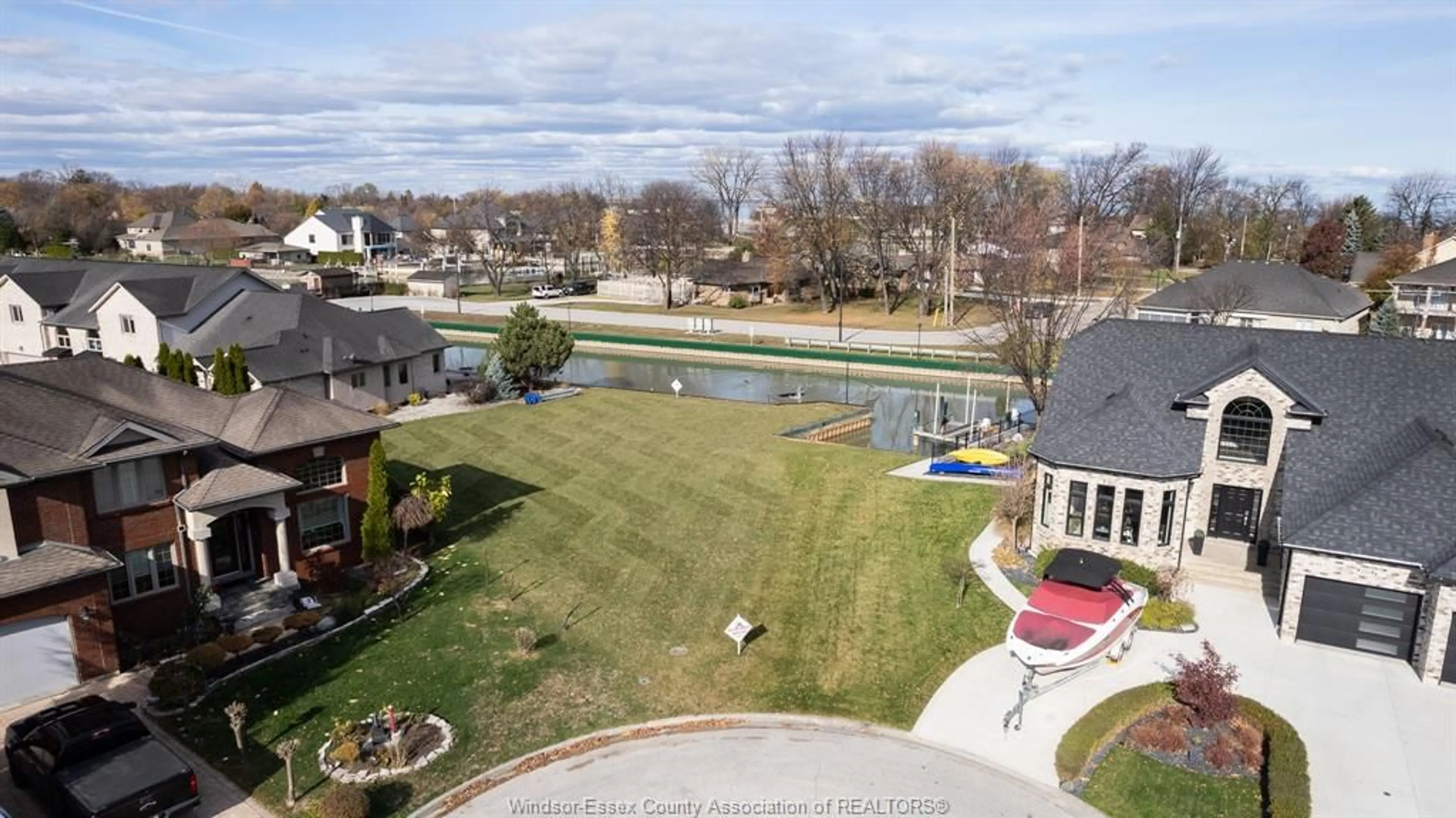A pic from outside/outdoor area/front of a property/back of a property/a pic from drone, water/lake/river/ocean view for 256 MOCERI Cres, Lakeshore Ontario N8N 5A9