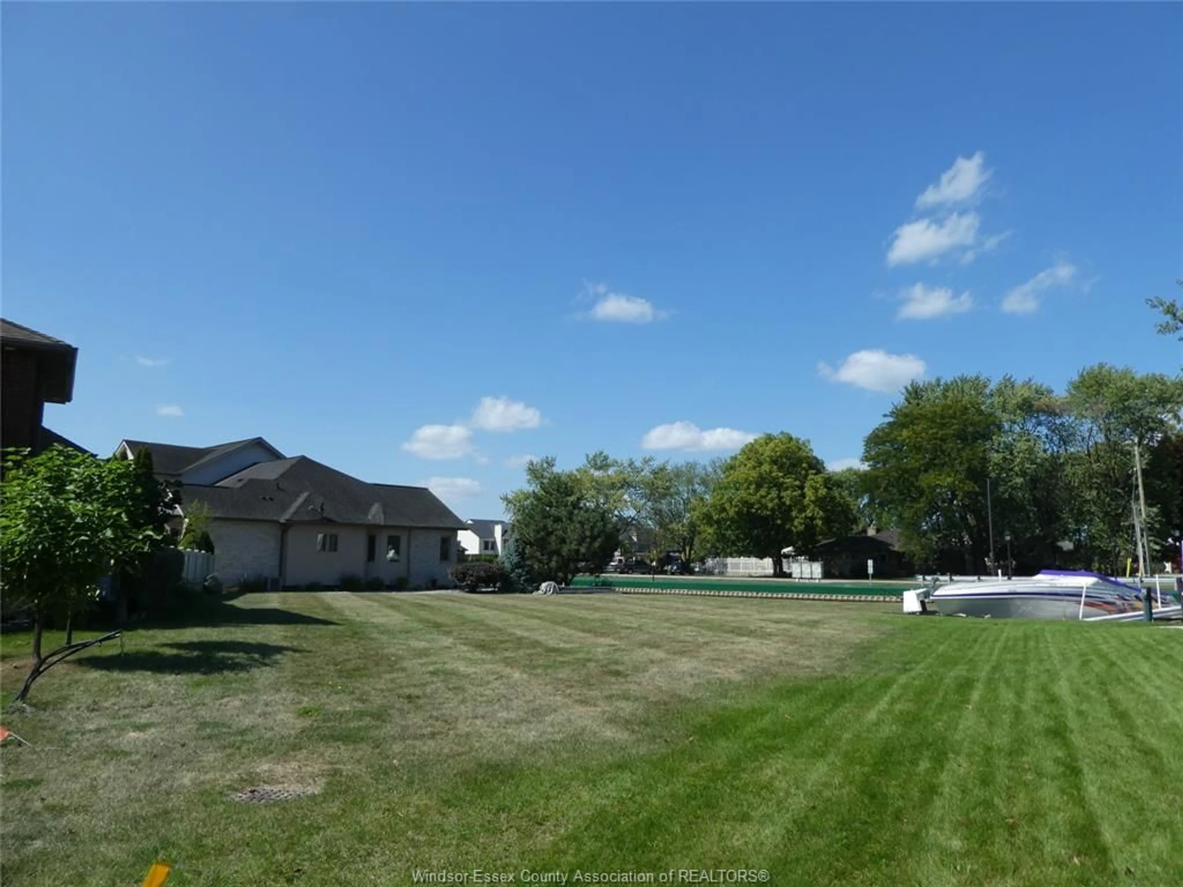 A pic from outside/outdoor area/front of a property/back of a property/a pic from drone, water/lake/river/ocean view for 256 MOCERI Cres, Lakeshore Ontario N8N 5A9