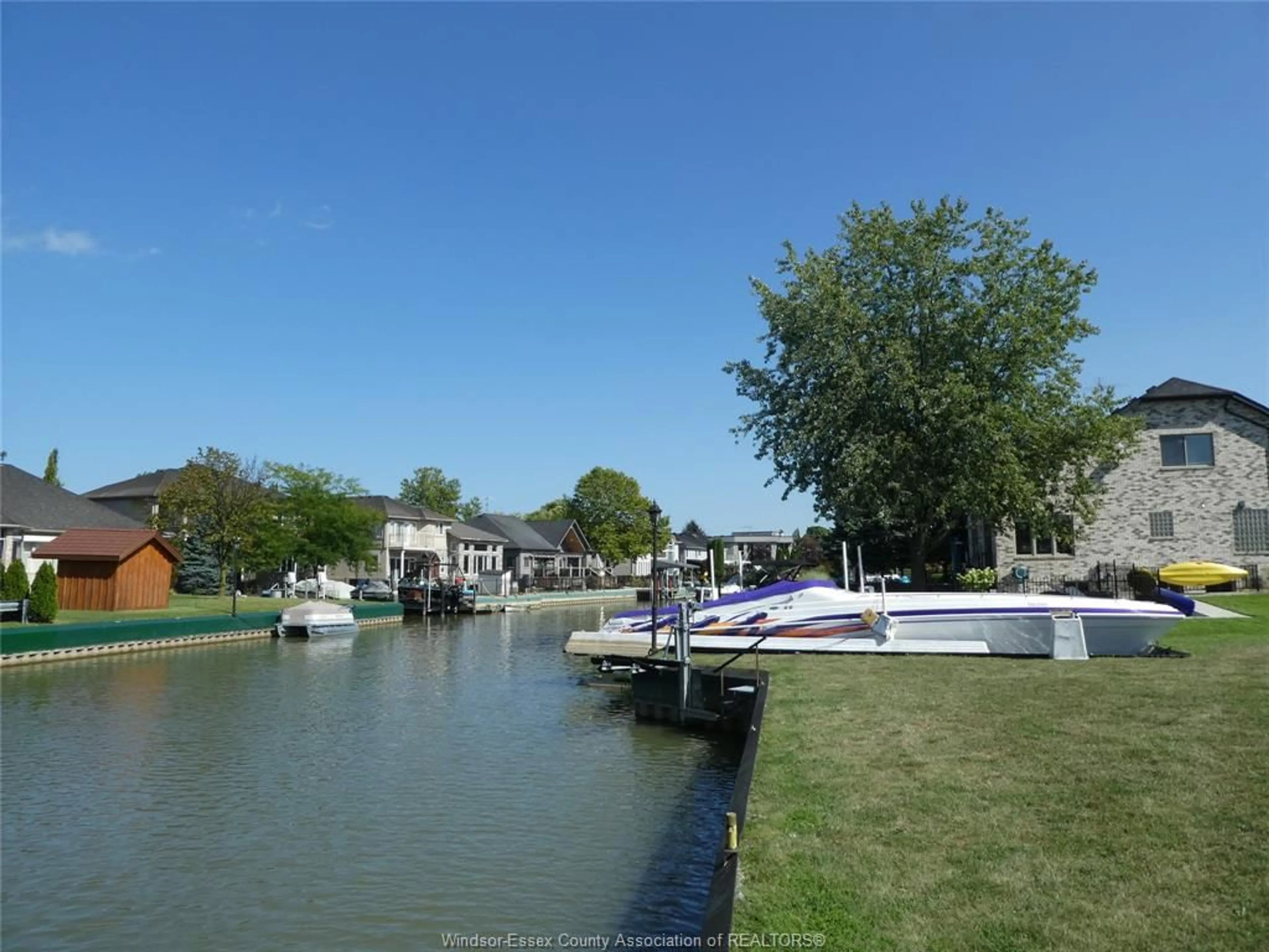 A pic from outside/outdoor area/front of a property/back of a property/a pic from drone, water/lake/river/ocean view for 256 MOCERI Cres, Lakeshore Ontario N8N 5A9