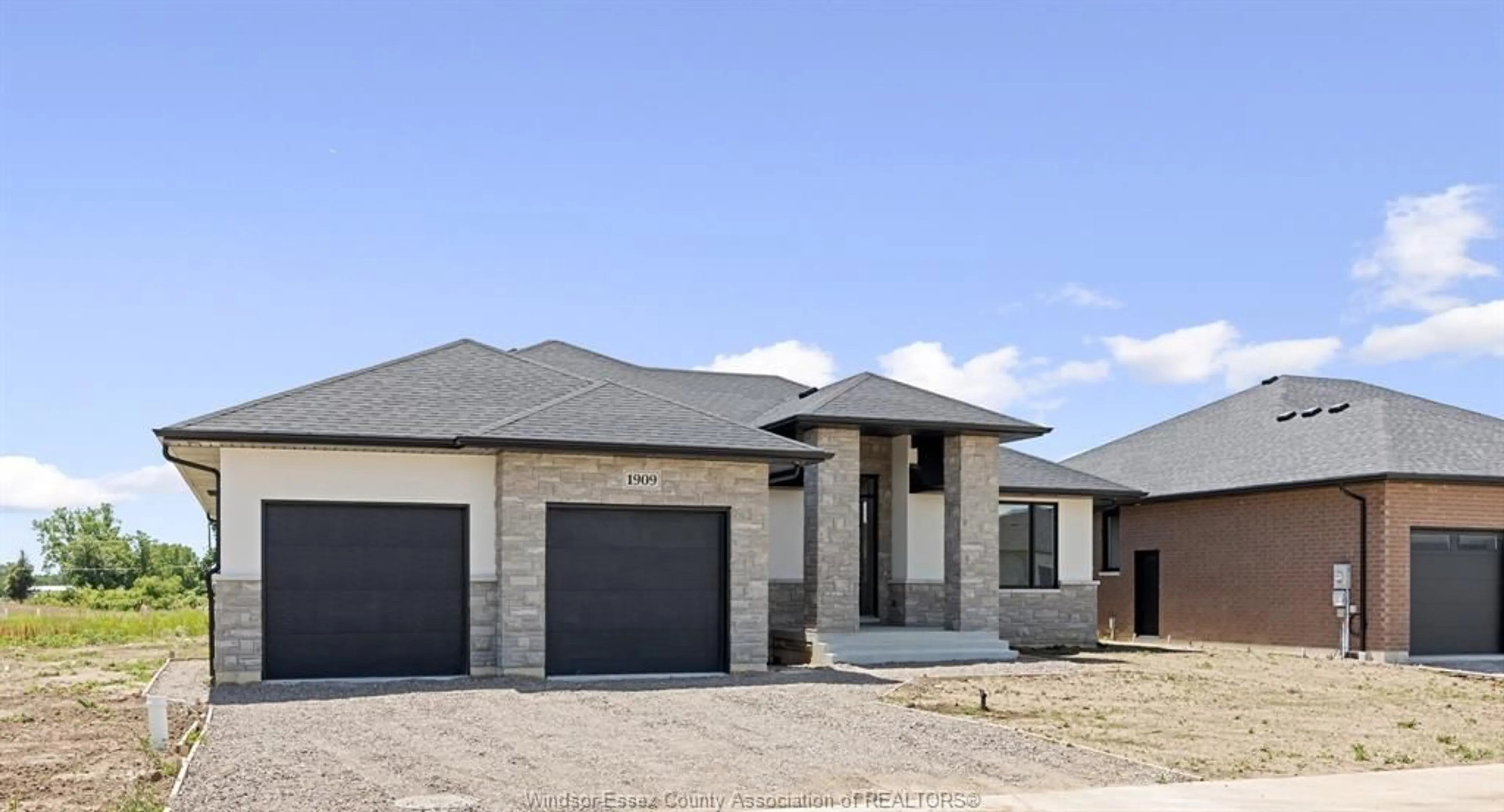 Home with brick exterior material, street for 1909 SANNITA Ave, Kingsville Ontario N9Y 0G6