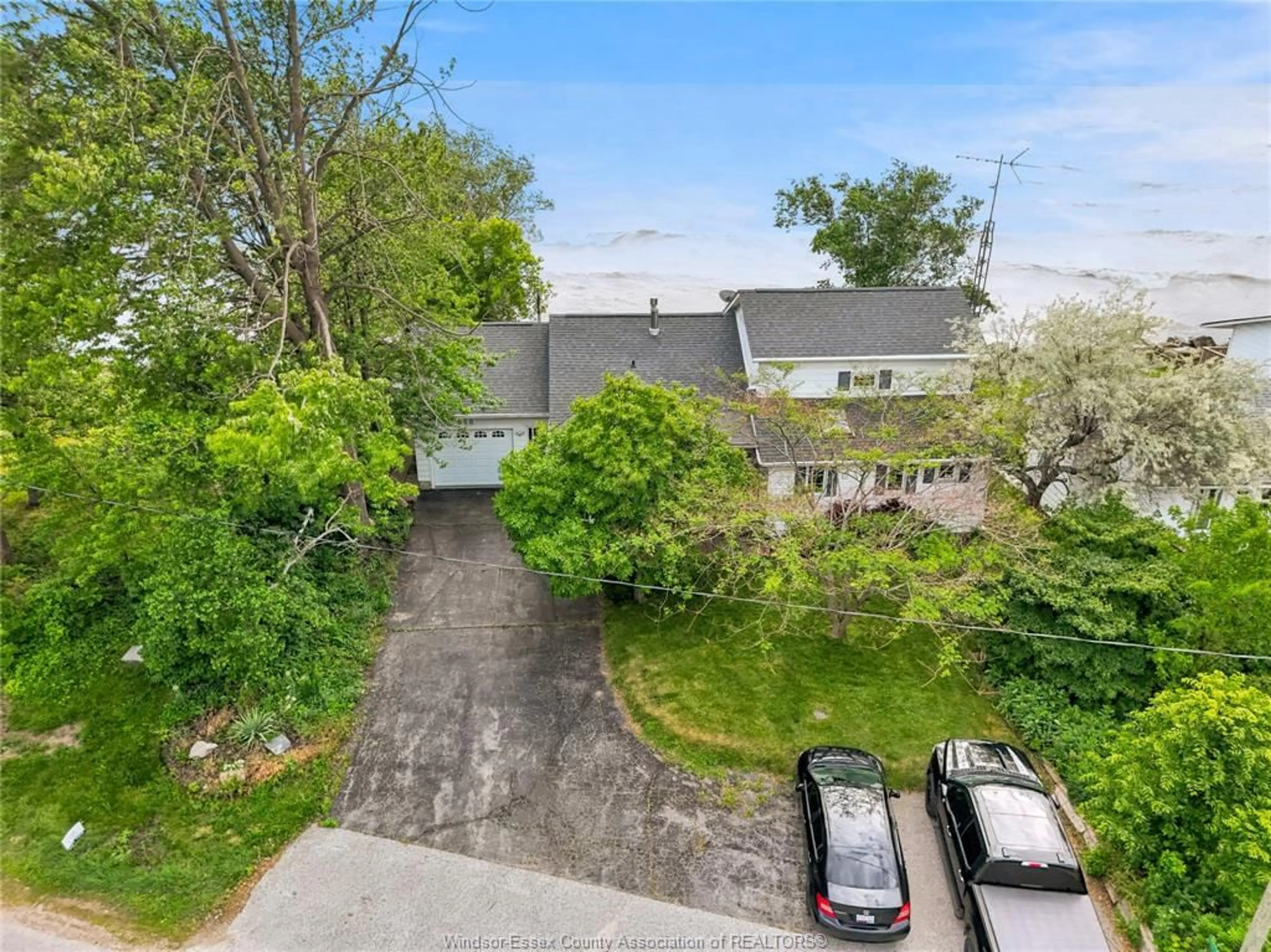 A pic from outside/outdoor area/front of a property/back of a property/a pic from drone, street for 866 POINT PELEE Dr, Leamington Ontario N8H 3V4