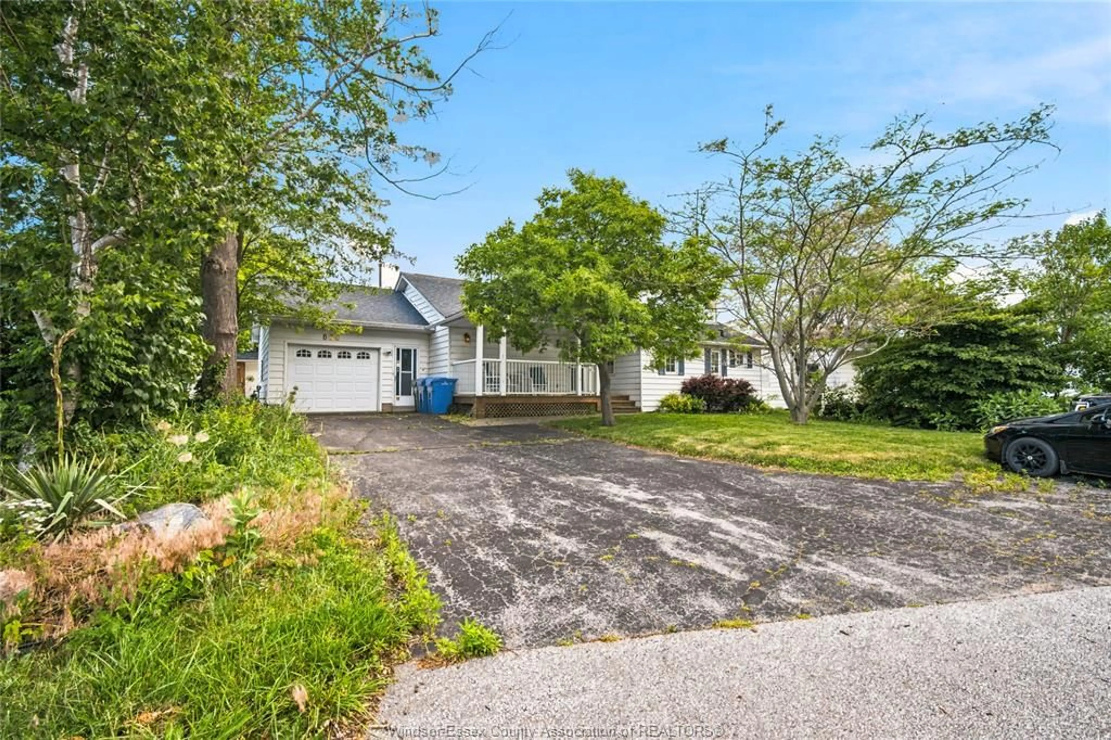 A pic from outside/outdoor area/front of a property/back of a property/a pic from drone, street for 866 POINT PELEE Dr, Leamington Ontario N8H 3V4