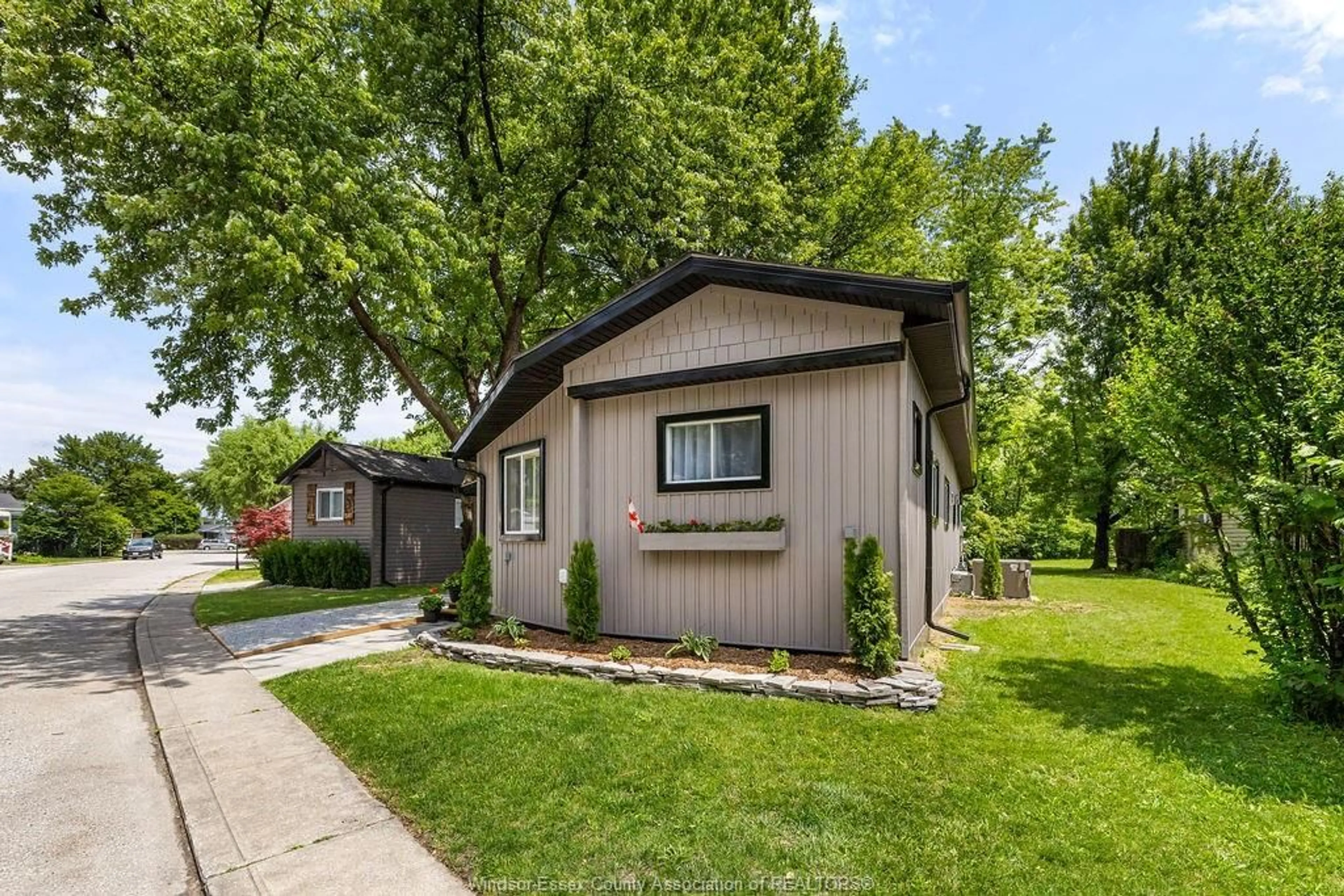Home with vinyl exterior material, street for 162 MICHAEL Dr, Lakeshore Ontario N8N 2V6