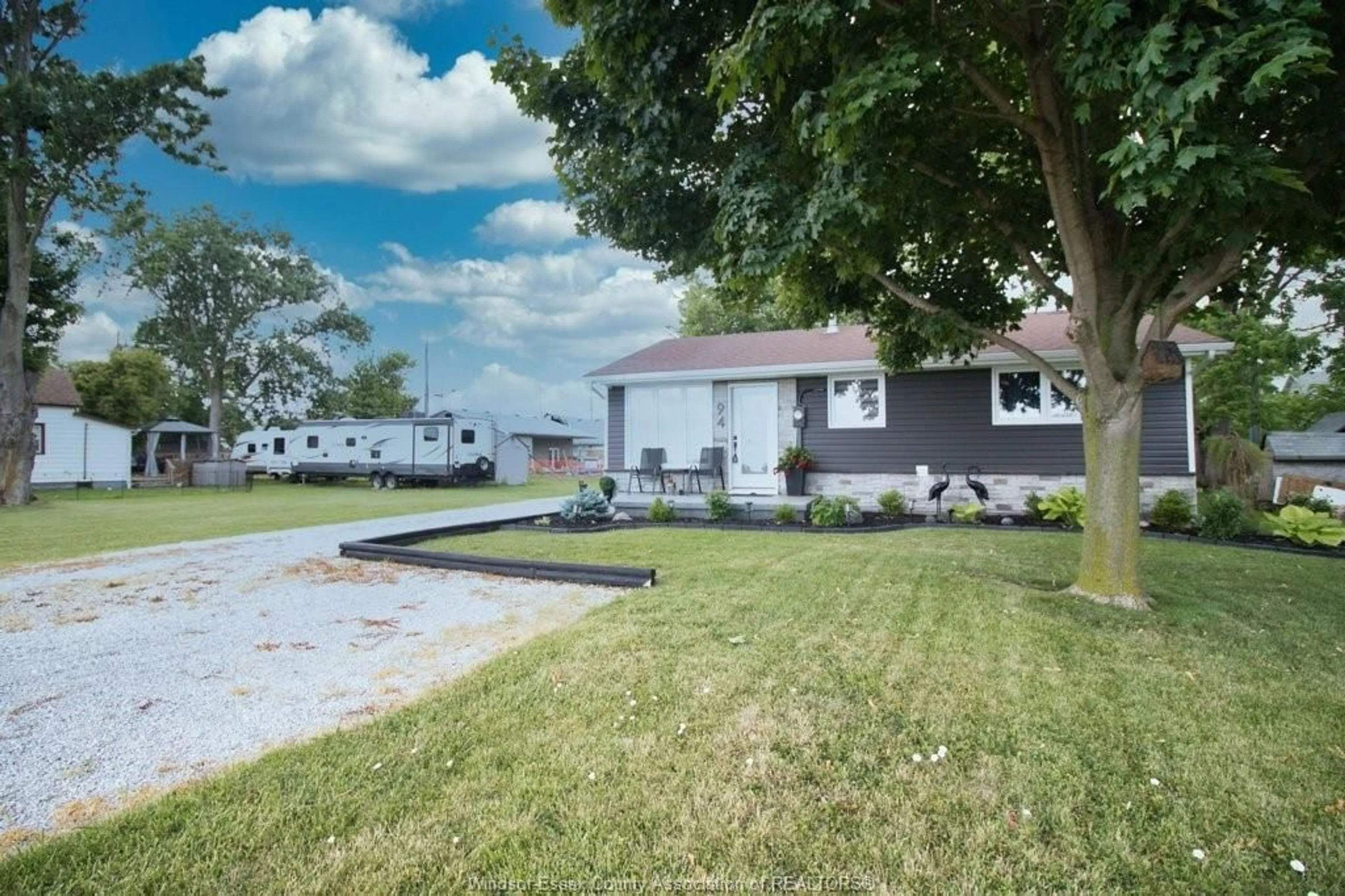 A pic from outside/outdoor area/front of a property/back of a property/a pic from drone, street for 94 Canal, Tilbury Ontario N0P 2L0