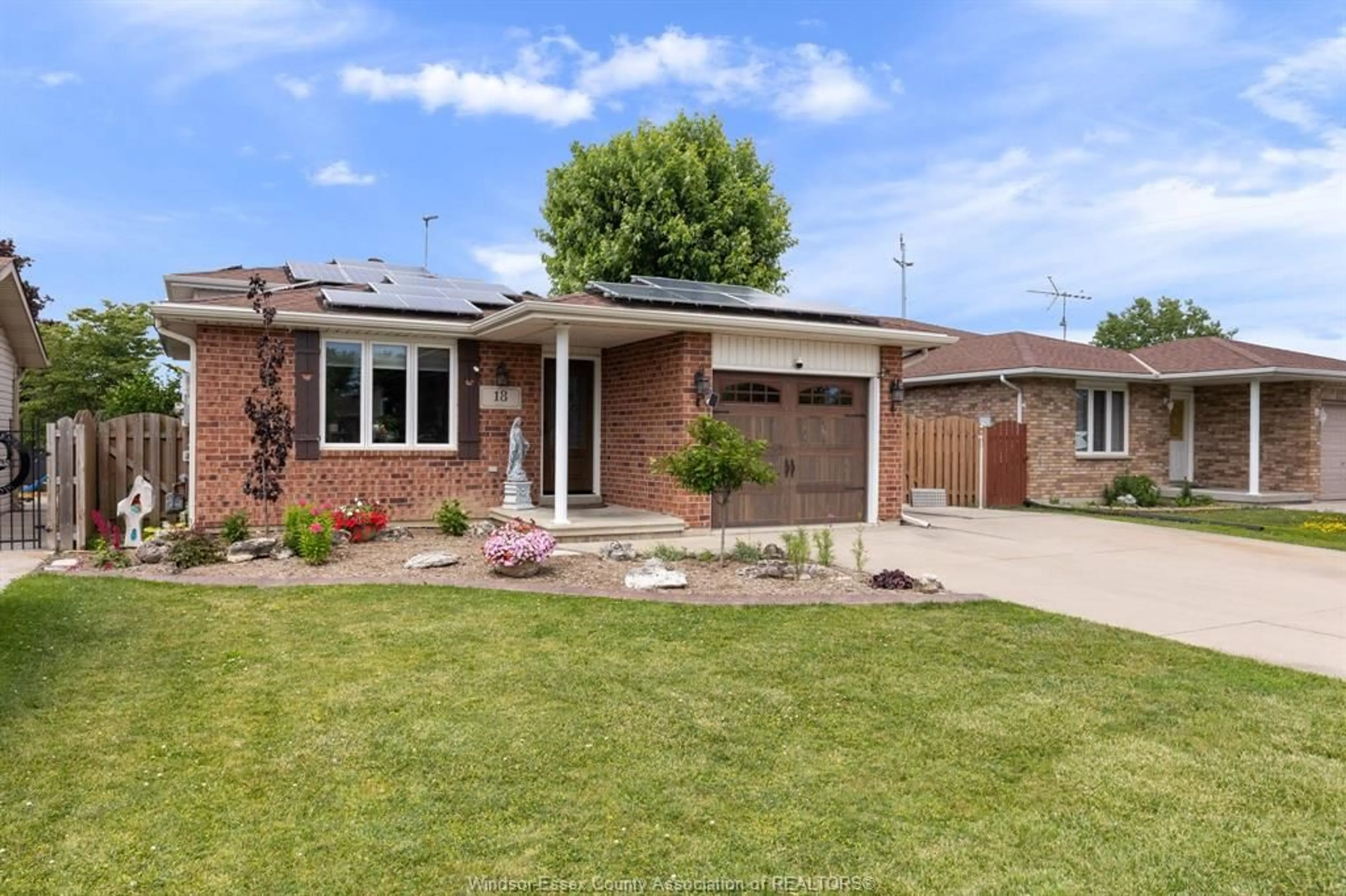Home with brick exterior material, street for 18 AZAR Dr, Tilbury Ontario N0P 2L0
