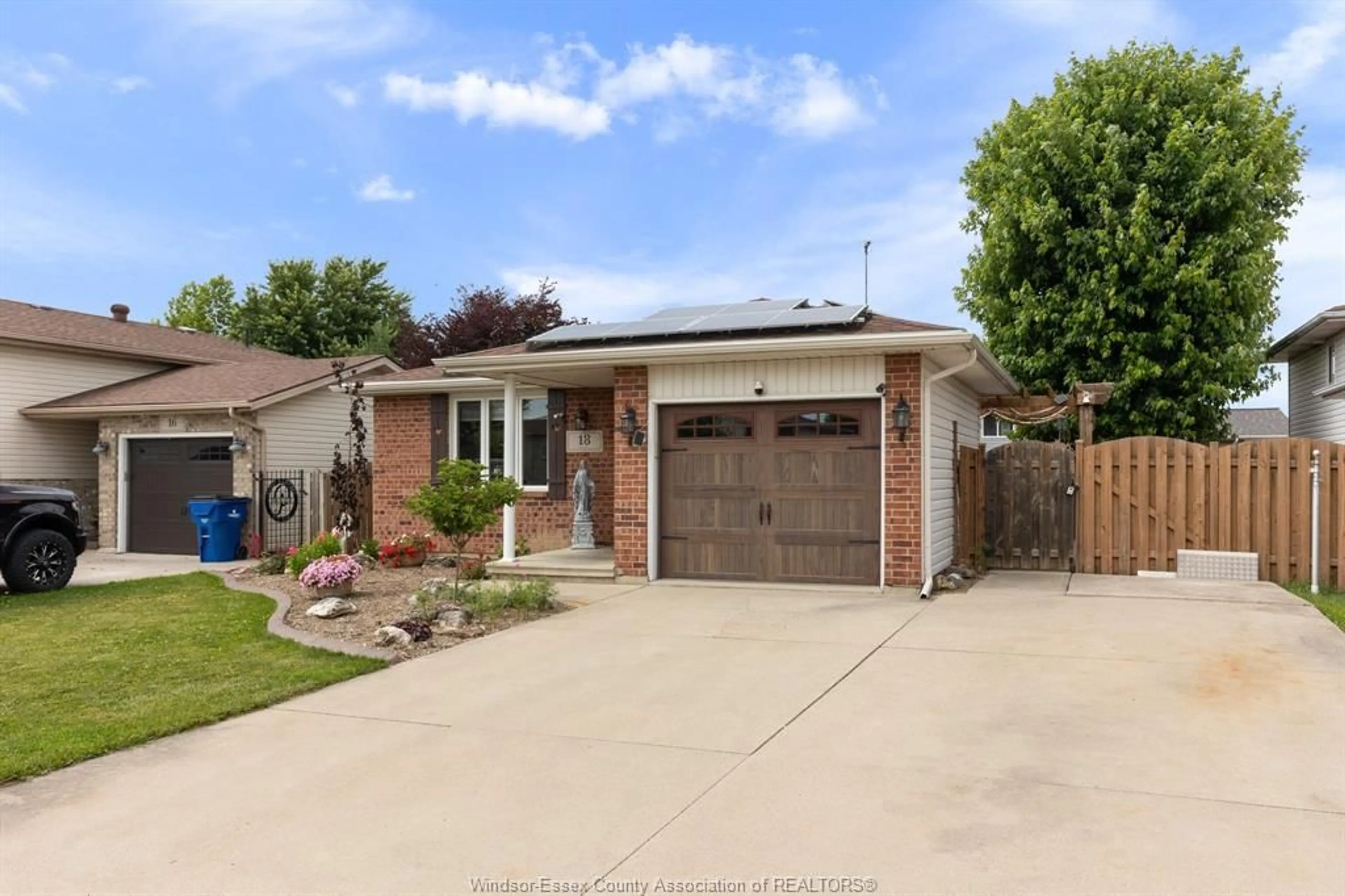 Home with brick exterior material, street for 18 AZAR Dr, Tilbury Ontario N0P 2L0