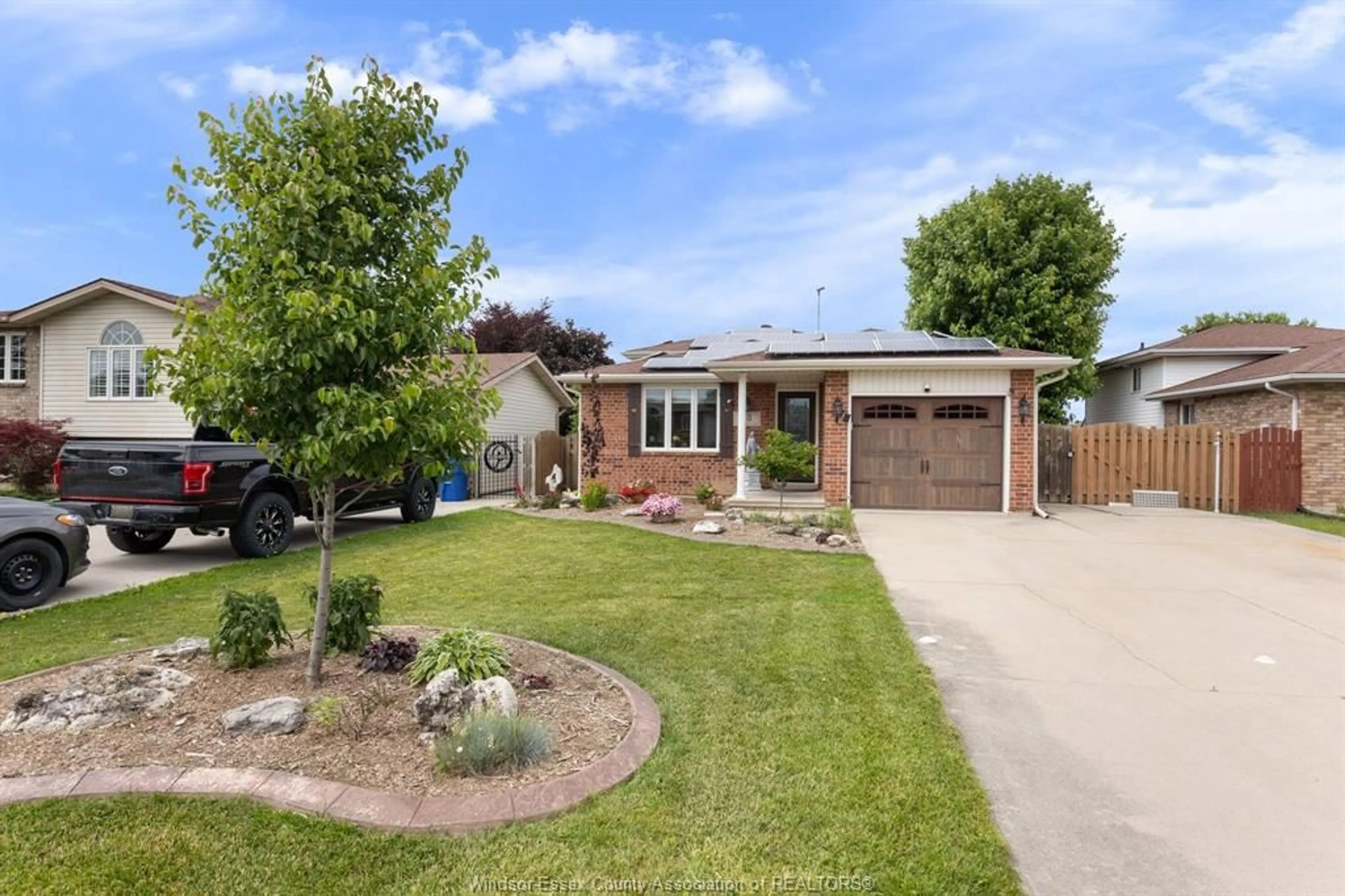 Home with brick exterior material, street for 18 AZAR Dr, Tilbury Ontario N0P 2L0