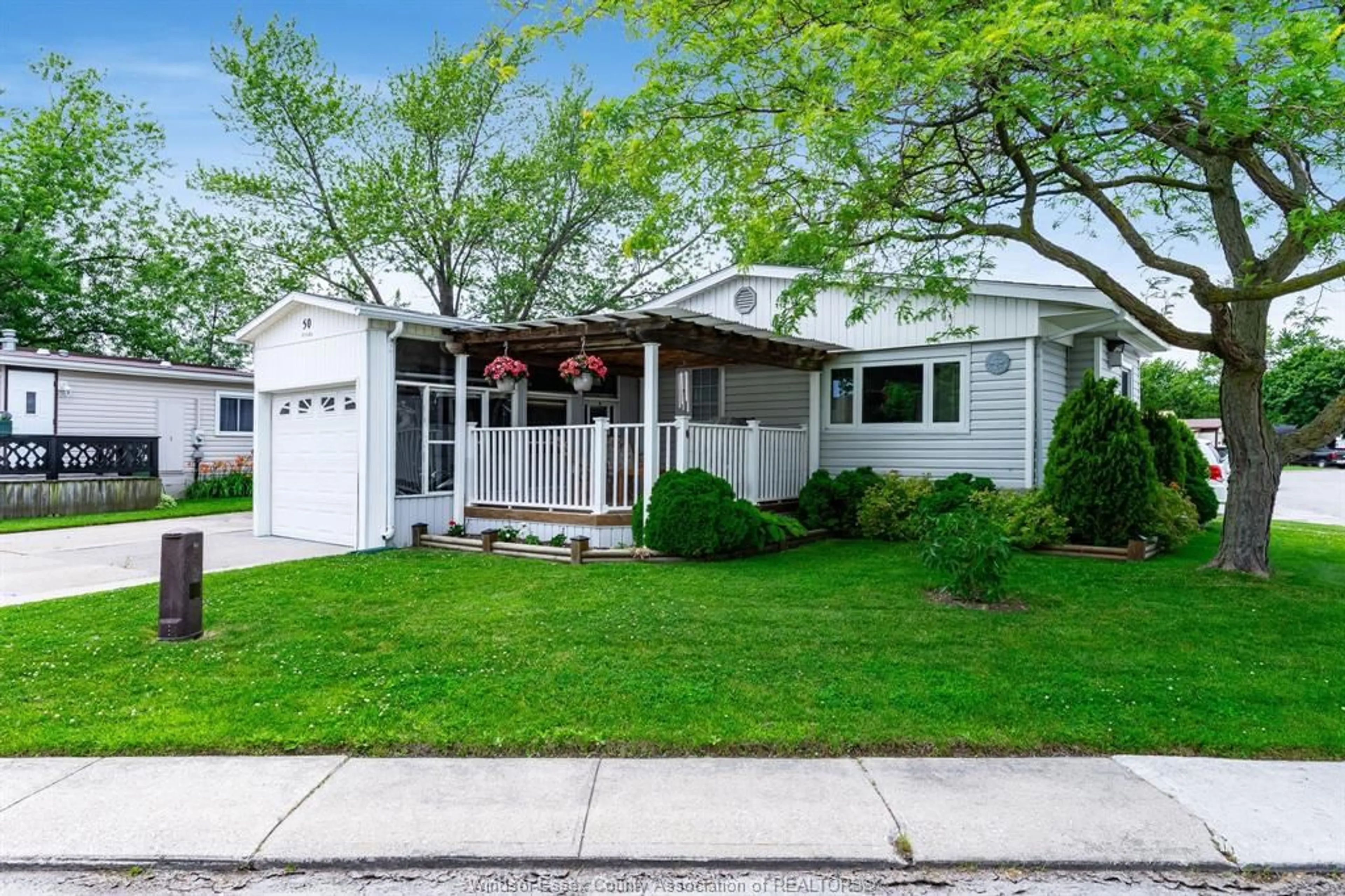 Home with vinyl exterior material, street for 50 DIANE, Essex Ontario N8M 1Z3