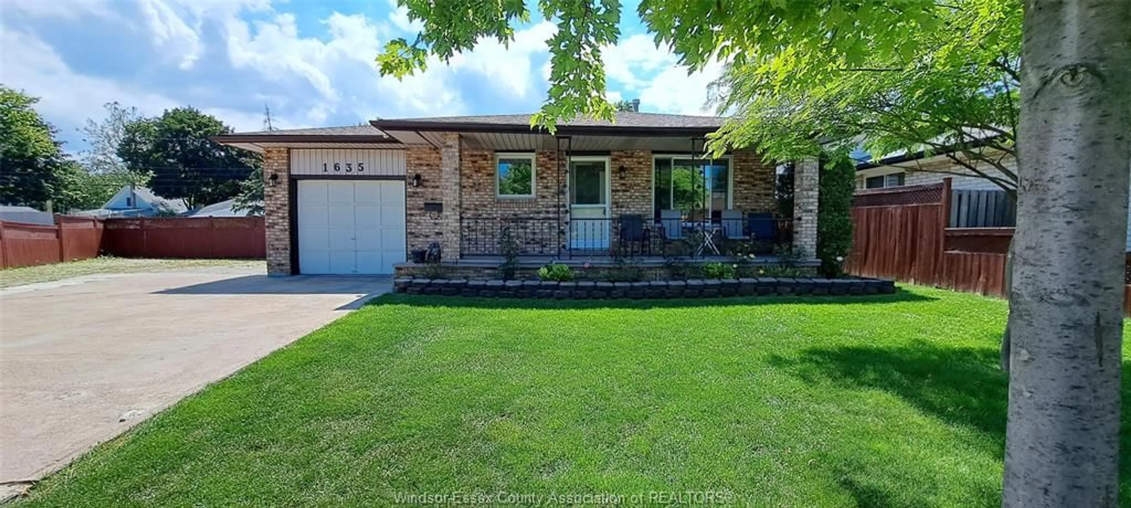 Home with brick exterior material, street for 1635 COURTLAND Cres, Windsor Ontario N8T 3K5
