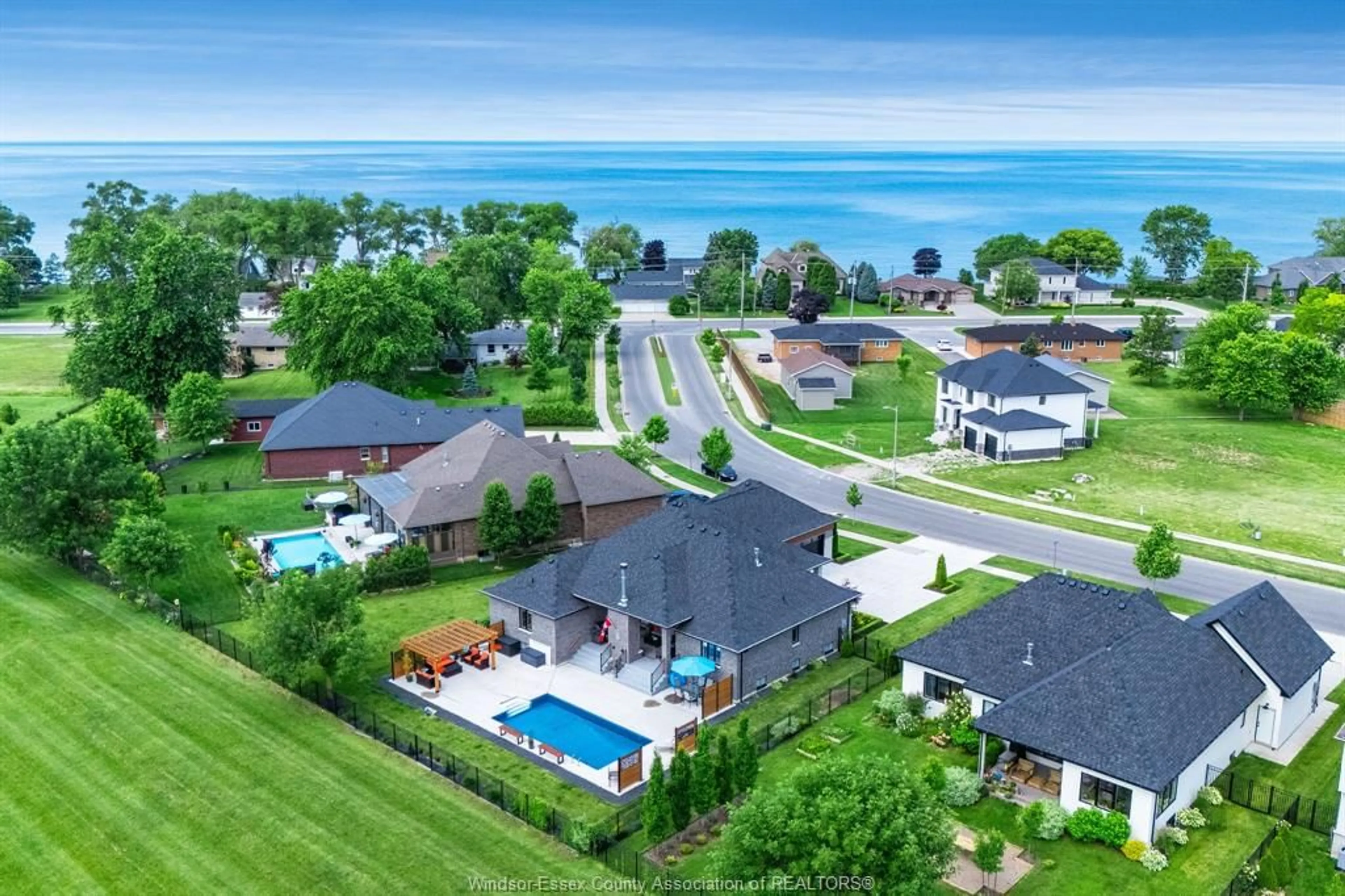 A pic from outside/outdoor area/front of a property/back of a property/a pic from drone, water/lake/river/ocean view for 6 Augusta Dr, Leamington Ontario N8H 0C7