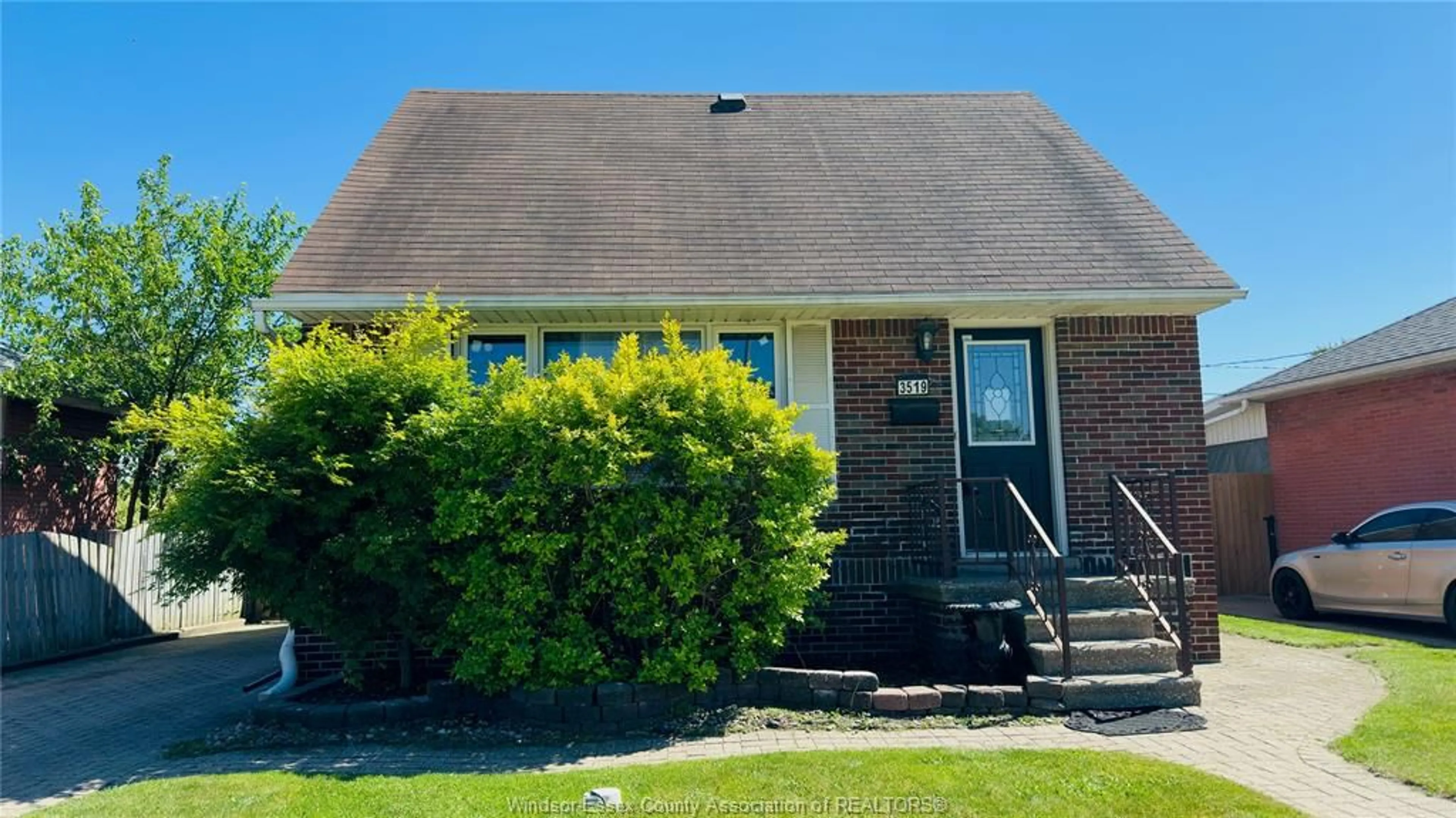 Home with brick exterior material, street for 3519 TECUMSEH Rd, Windsor Ontario N9C 2B6
