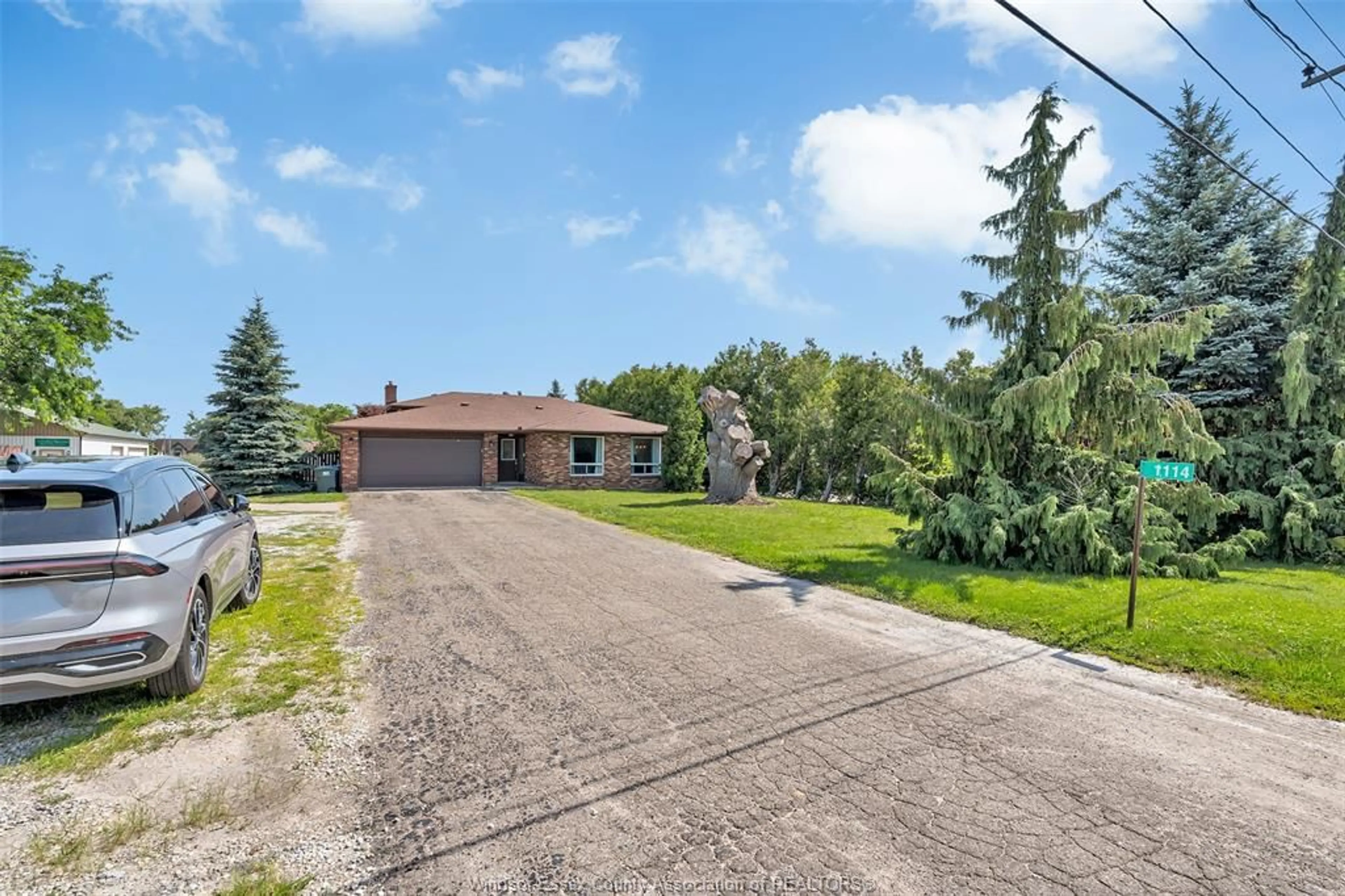 A pic from outside/outdoor area/front of a property/back of a property/a pic from drone, street for 1114 COUNTY RD 22, Lakeshore Ontario N0R 1A0