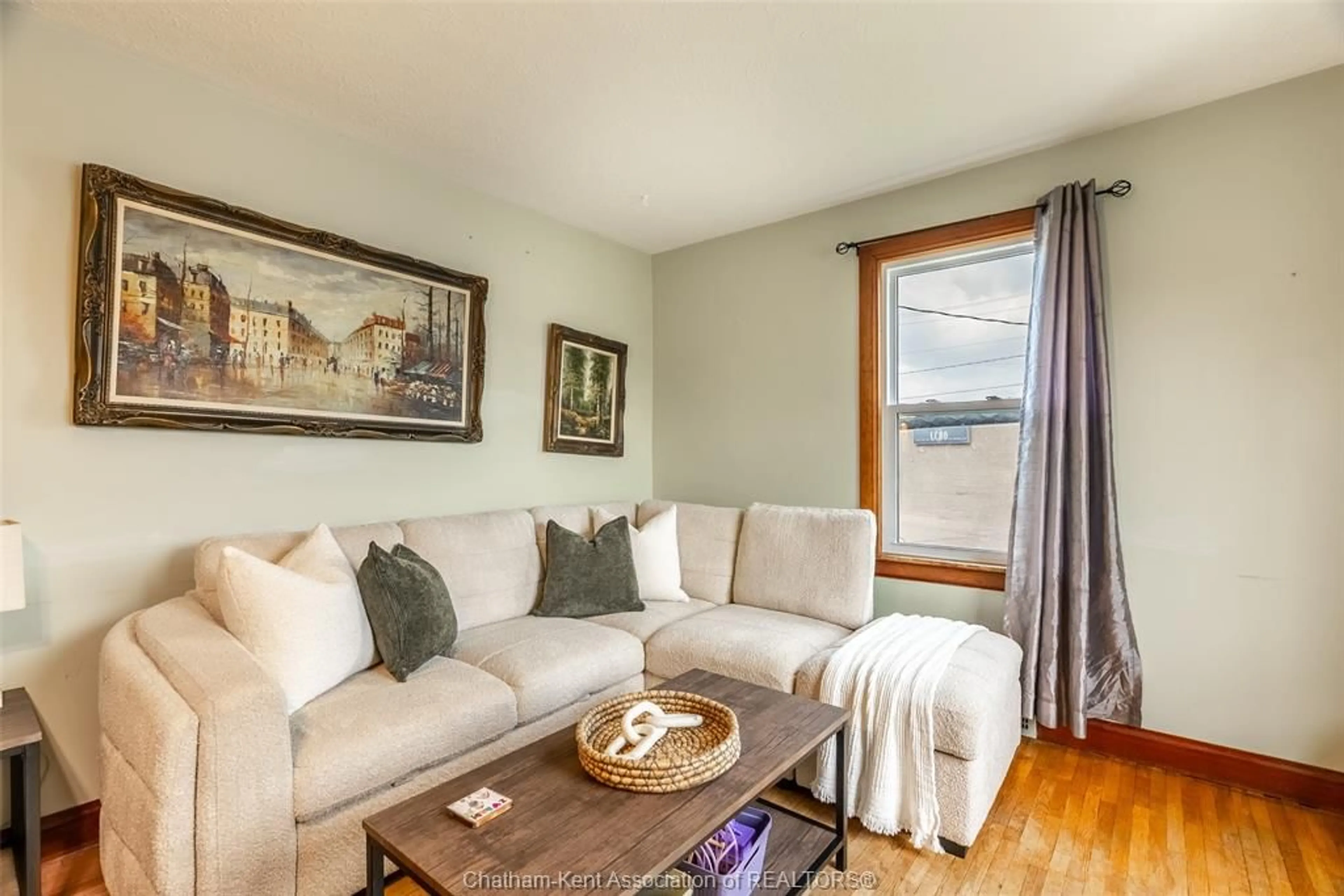 Living room with furniture, wood/laminate floor for 30 Marlborough St, Blenheim Ontario N0P 1A0