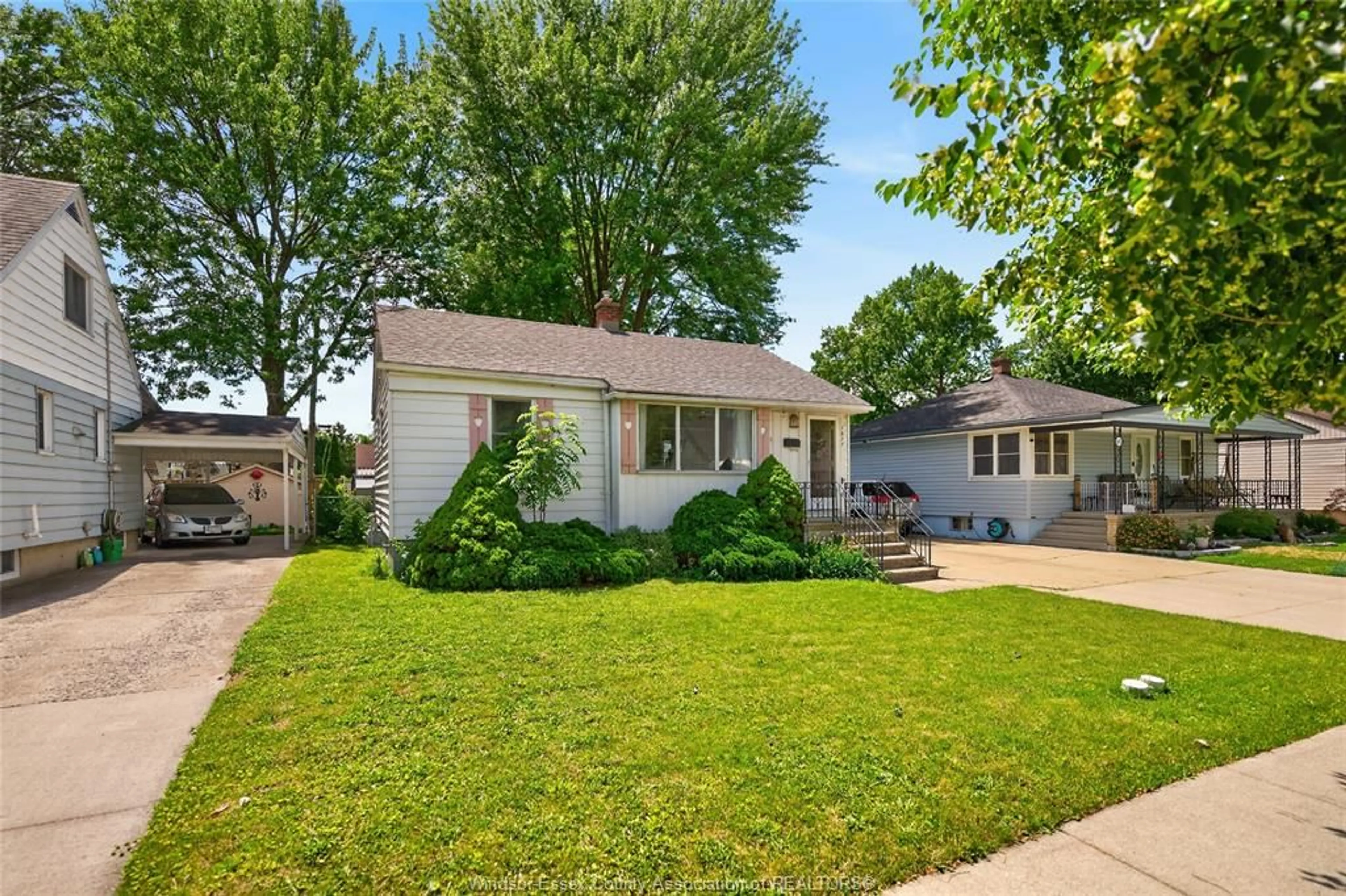Home with vinyl exterior material, street for 1677 Norman Rd, Windsor Ontario N8Y 4N6