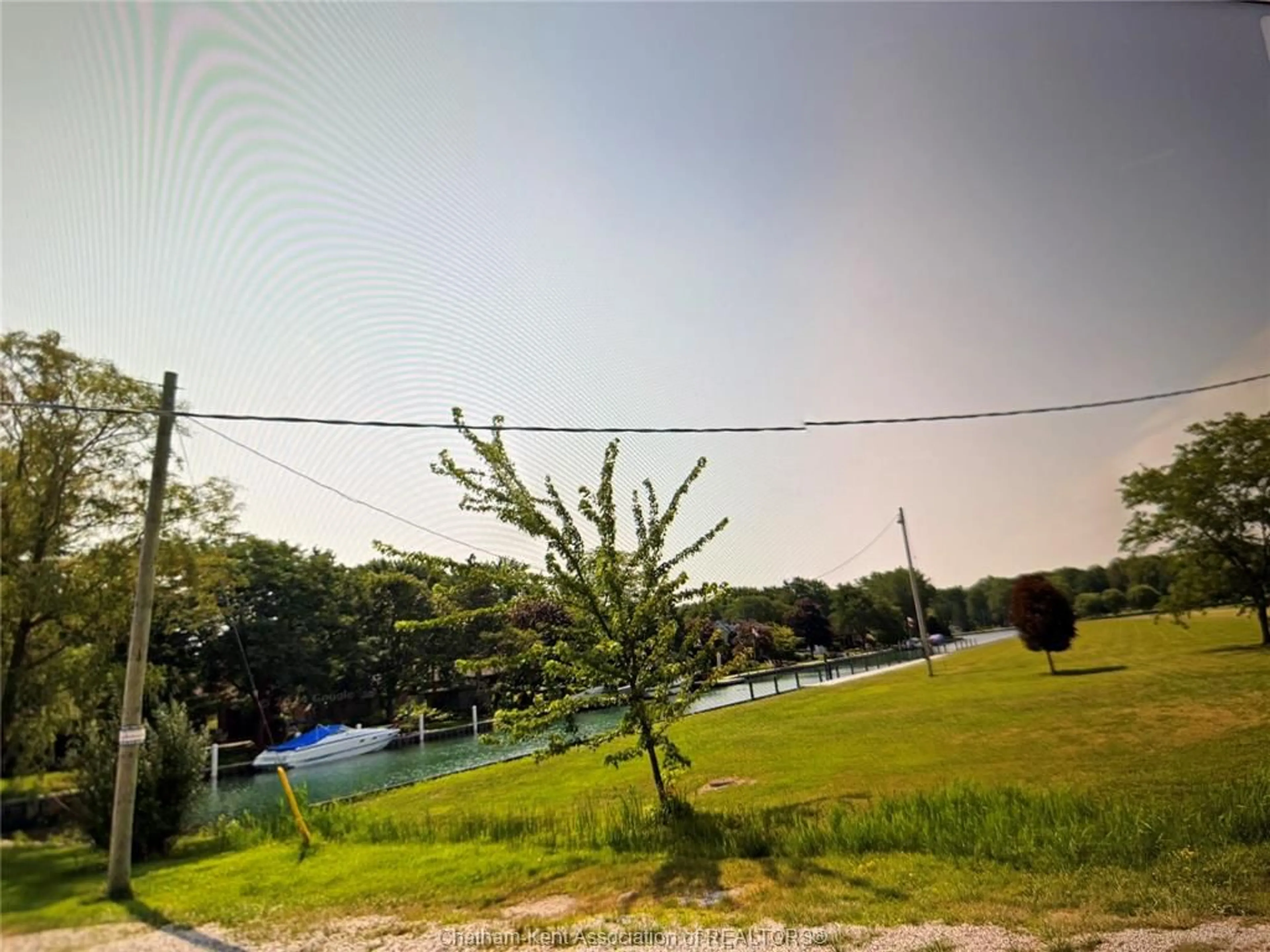 A pic from outside/outdoor area/front of a property/back of a property/a pic from drone, forest/trees view for 4761 Old River Rd, Chatham Township Ontario N0P 2B0