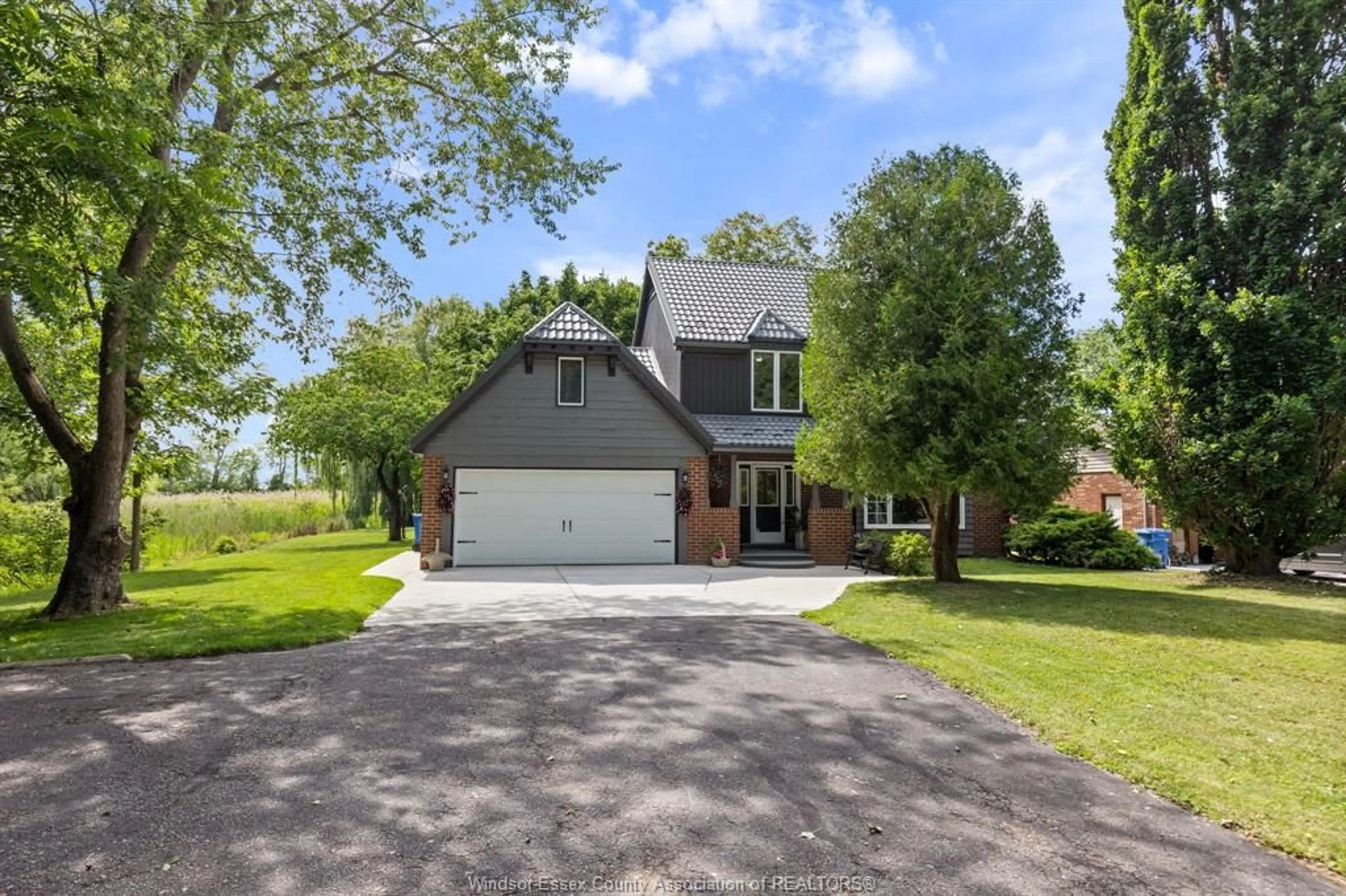 A pic from outside/outdoor area/front of a property/back of a property/a pic from drone, street for 2028 FRONT Rd, Amherstburg Ontario N9V 3R3