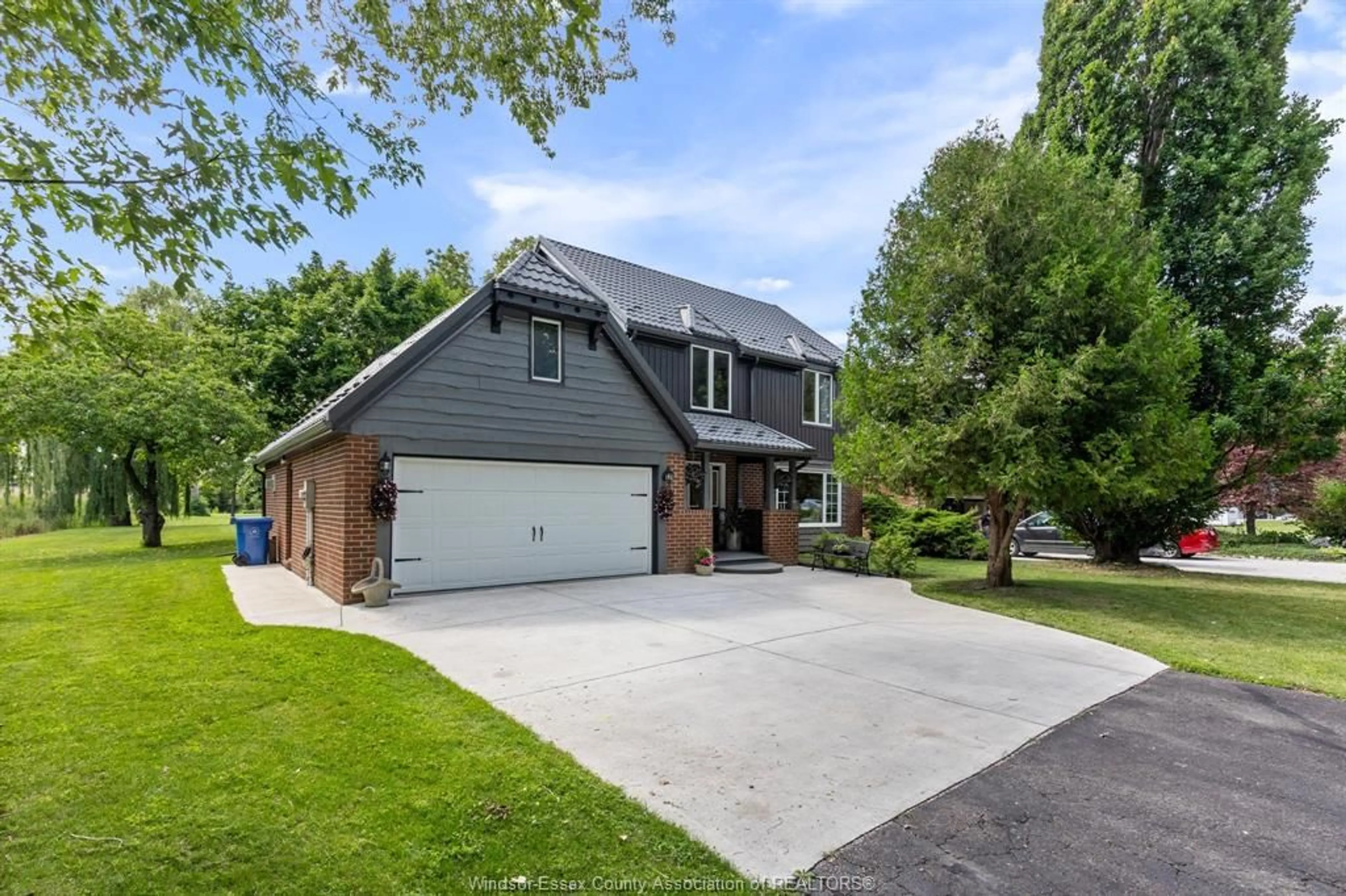 A pic from outside/outdoor area/front of a property/back of a property/a pic from drone, street for 2028 FRONT Rd, Amherstburg Ontario N9V 3R3