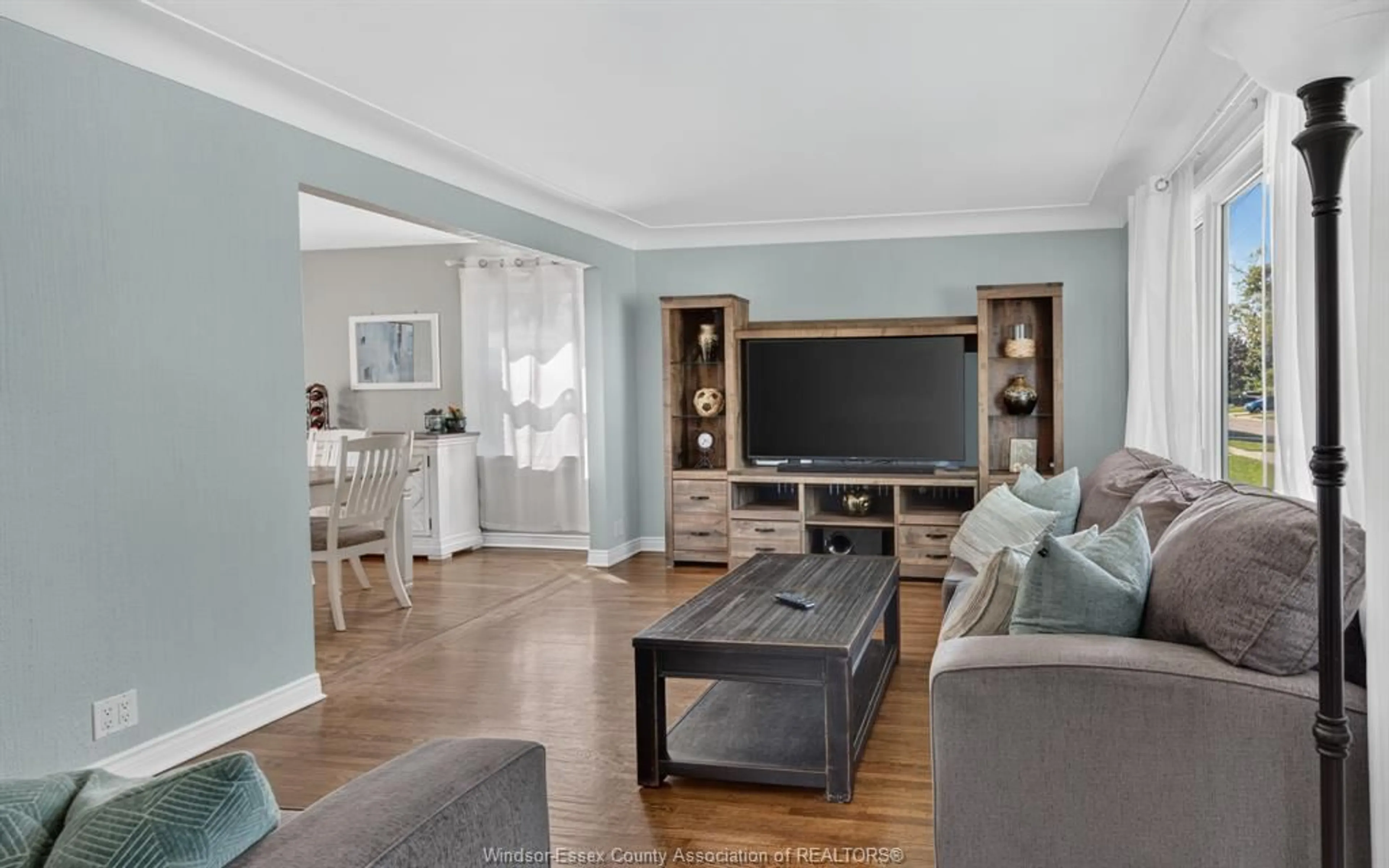 Living room with furniture, wood/laminate floor for 2004 NORMAN, Windsor Ontario N8T 1S4