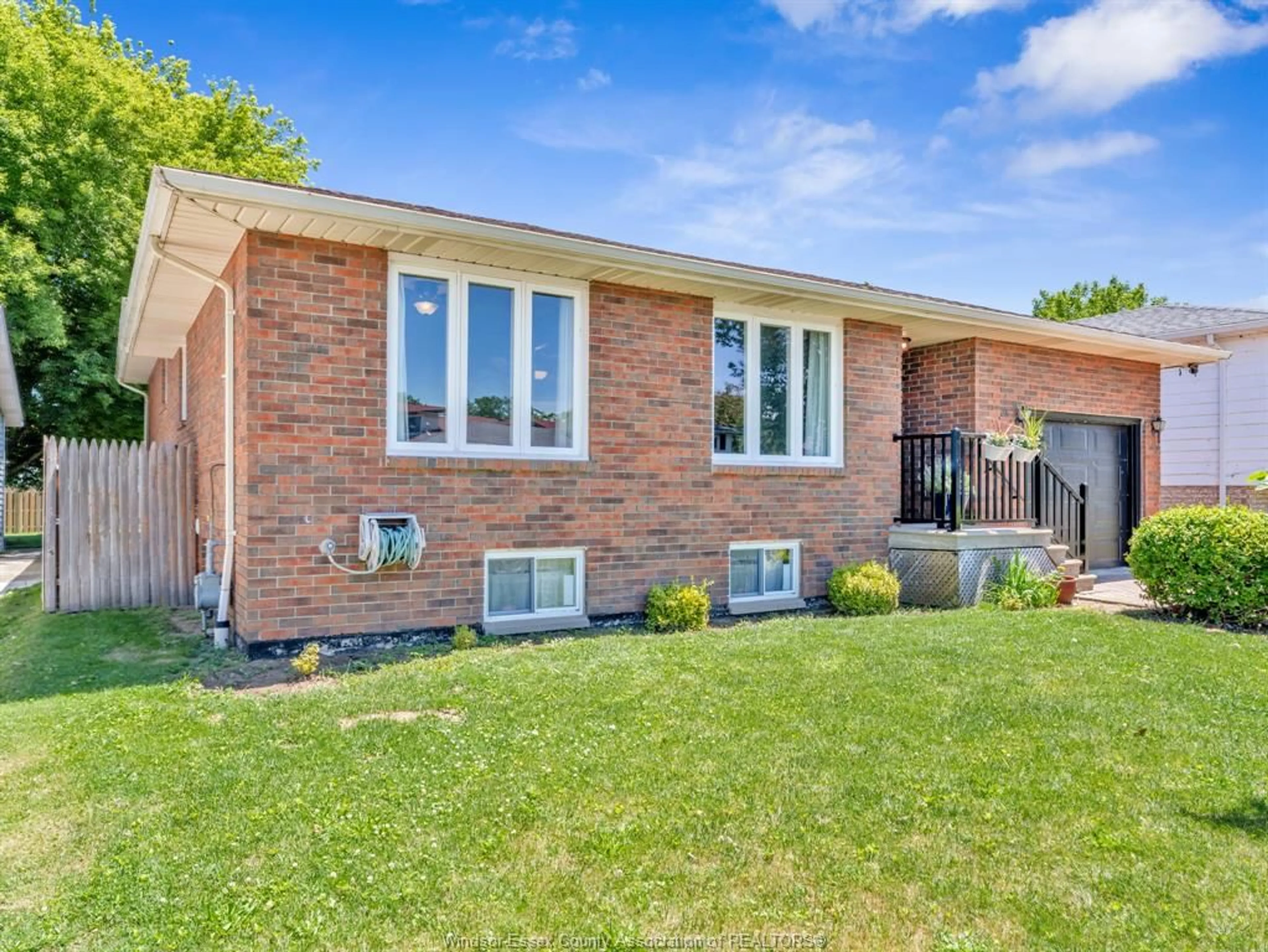 Home with brick exterior material, street for 24 CAMELOT, Leamington Ontario N8H 4V6