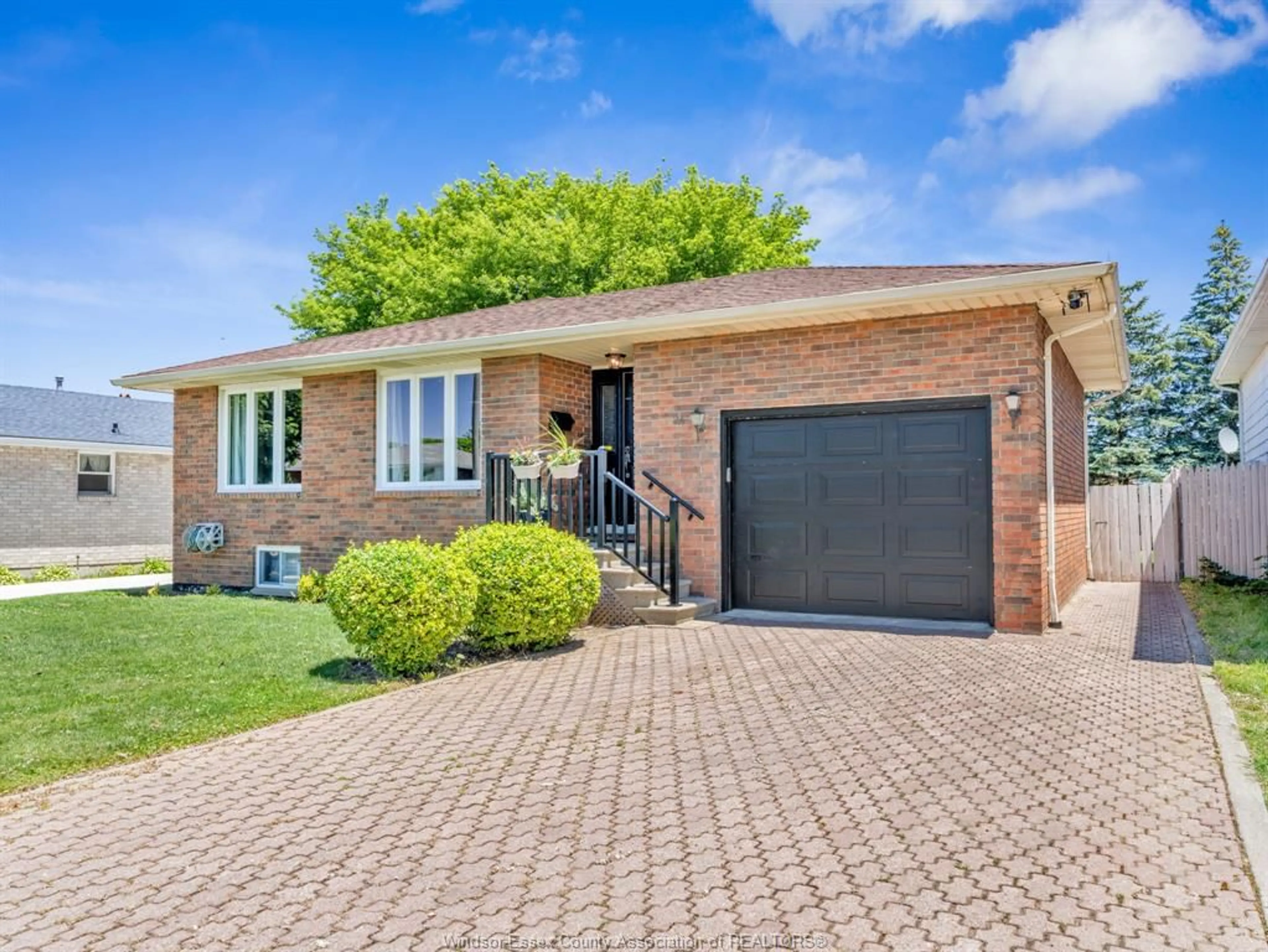 Home with brick exterior material, street for 24 CAMELOT, Leamington Ontario N8H 4V6
