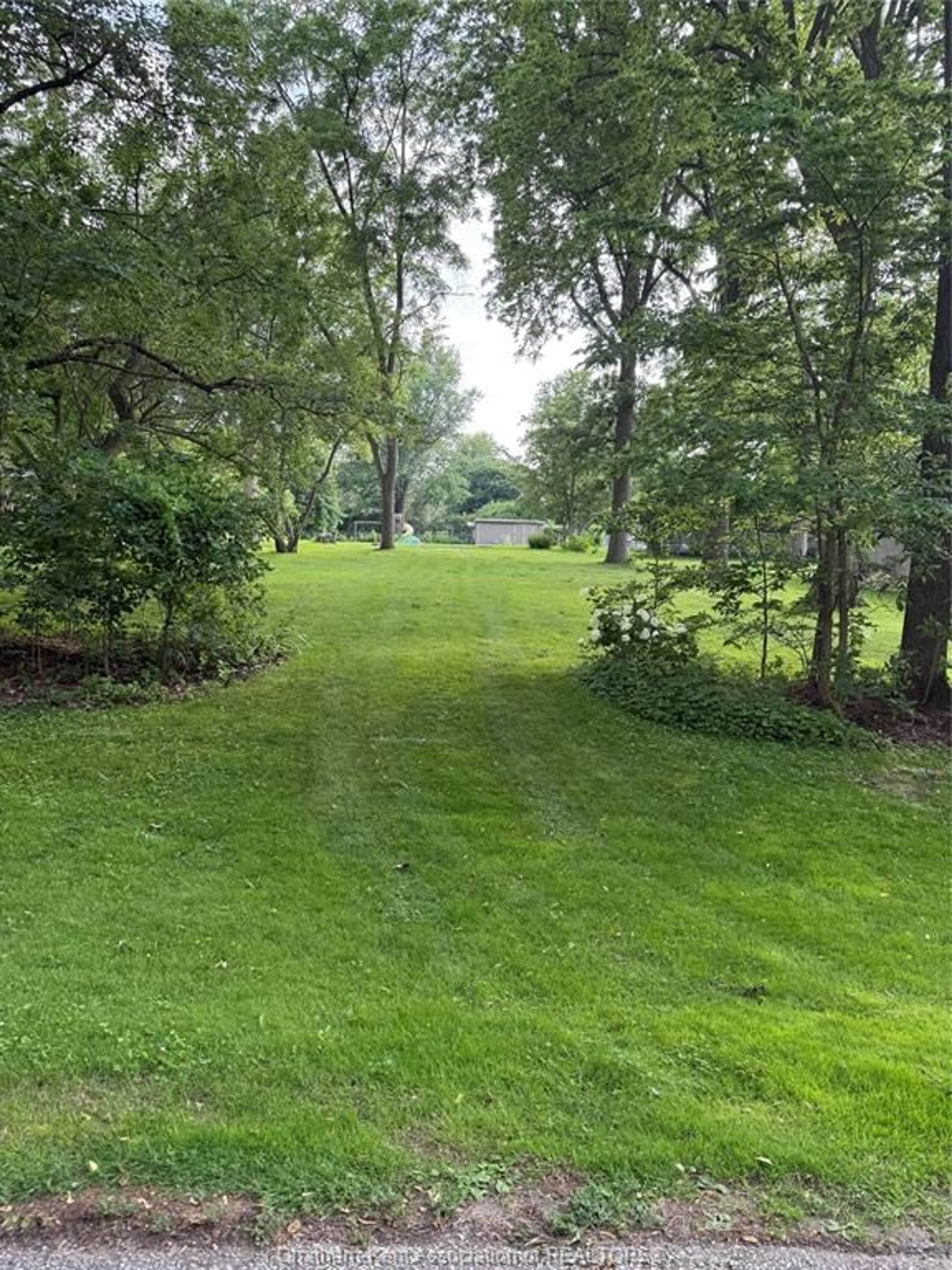 A pic from outside/outdoor area/front of a property/back of a property/a pic from drone, forest/trees view for VL Briarhill Rd, Chatham Ontario N7M 4H3