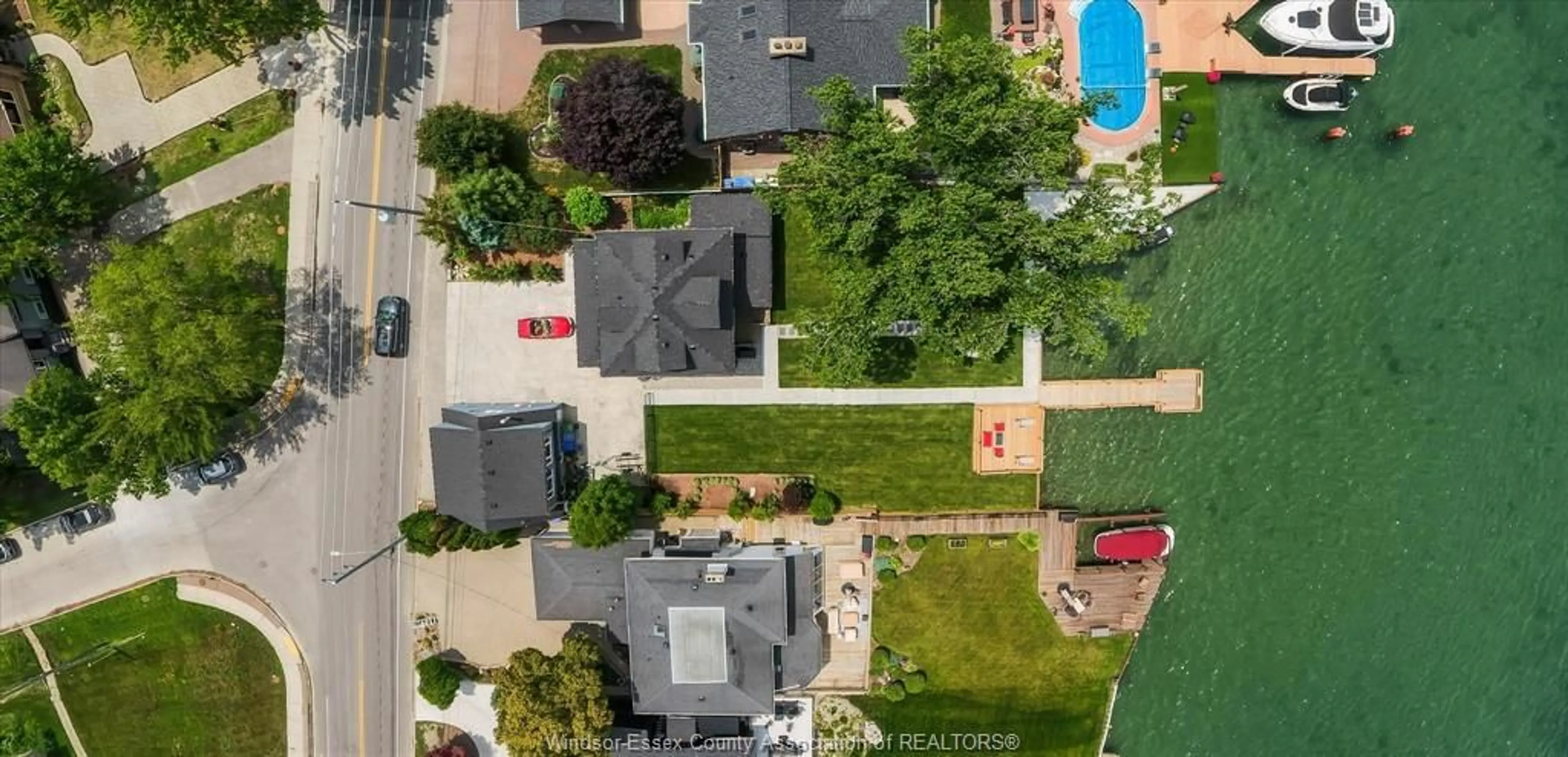 A pic from outside/outdoor area/front of a property/back of a property/a pic from drone, street for 8190 RIVERSIDE Dr, Windsor Ontario N8S 1E4