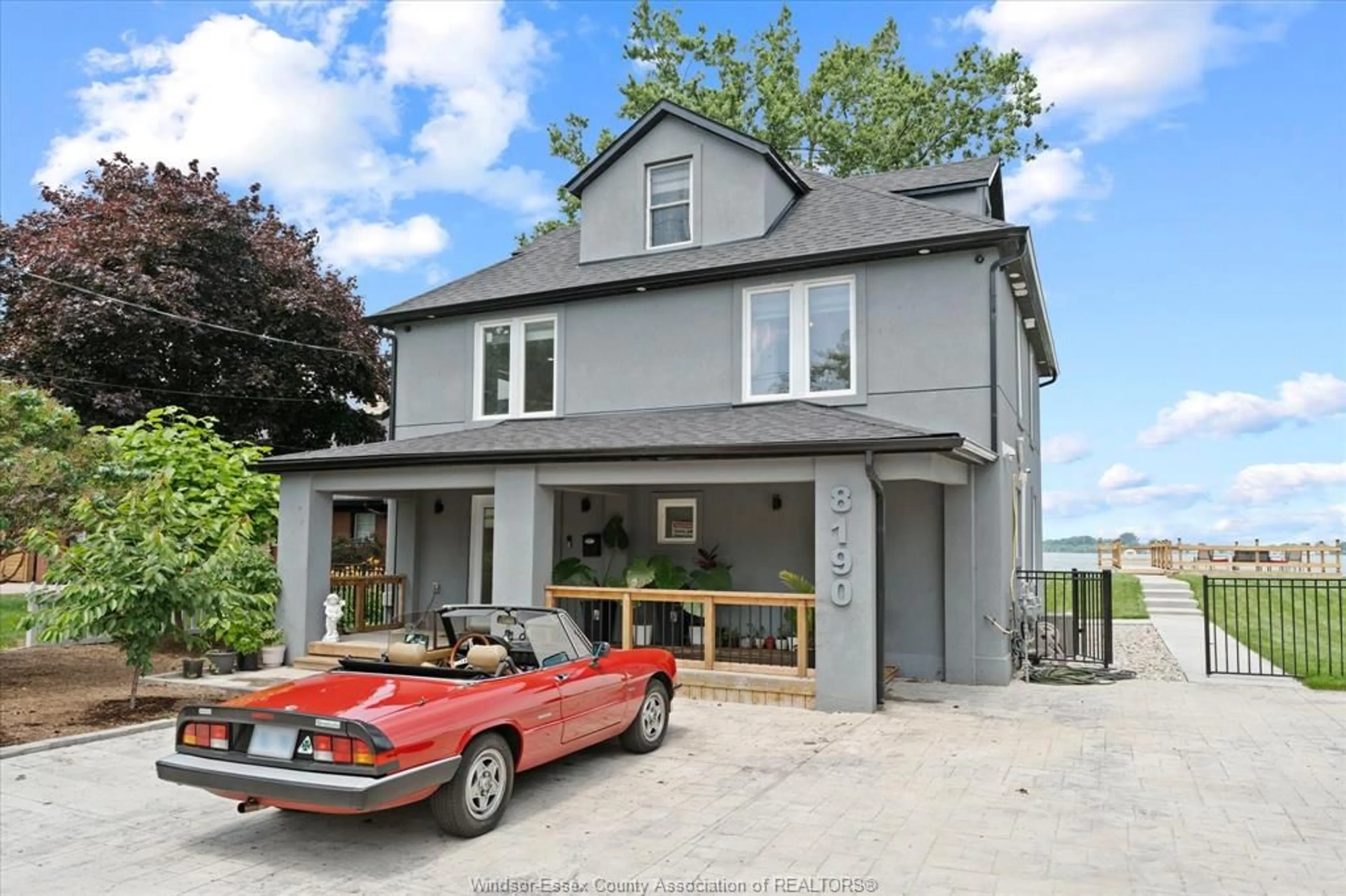 Home with brick exterior material, street for 8190 RIVERSIDE Dr, Windsor Ontario N8S 1E4