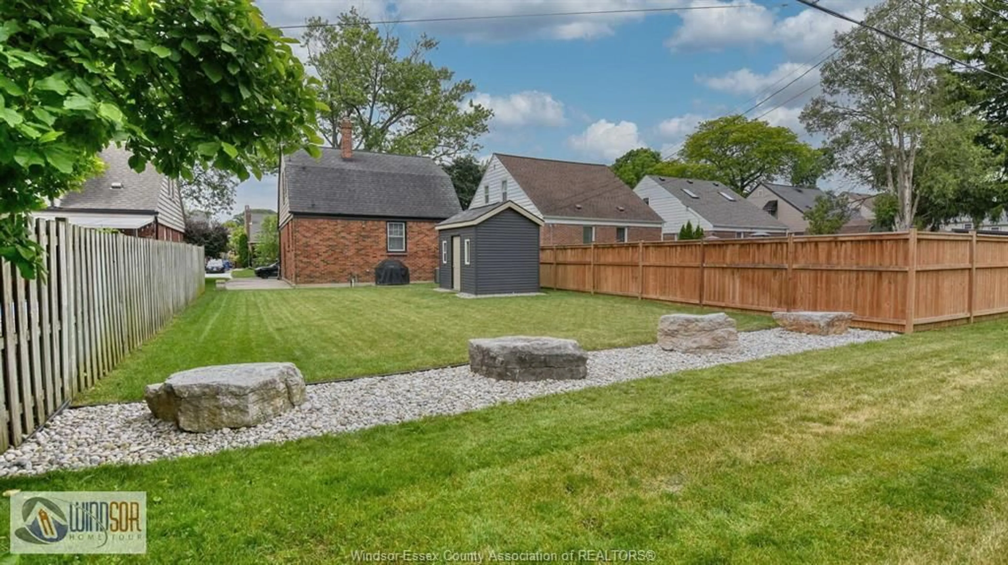 A pic from outside/outdoor area/front of a property/back of a property/a pic from drone, street for 2332 MOY Ave, Windsor Ontario N8W 2M8